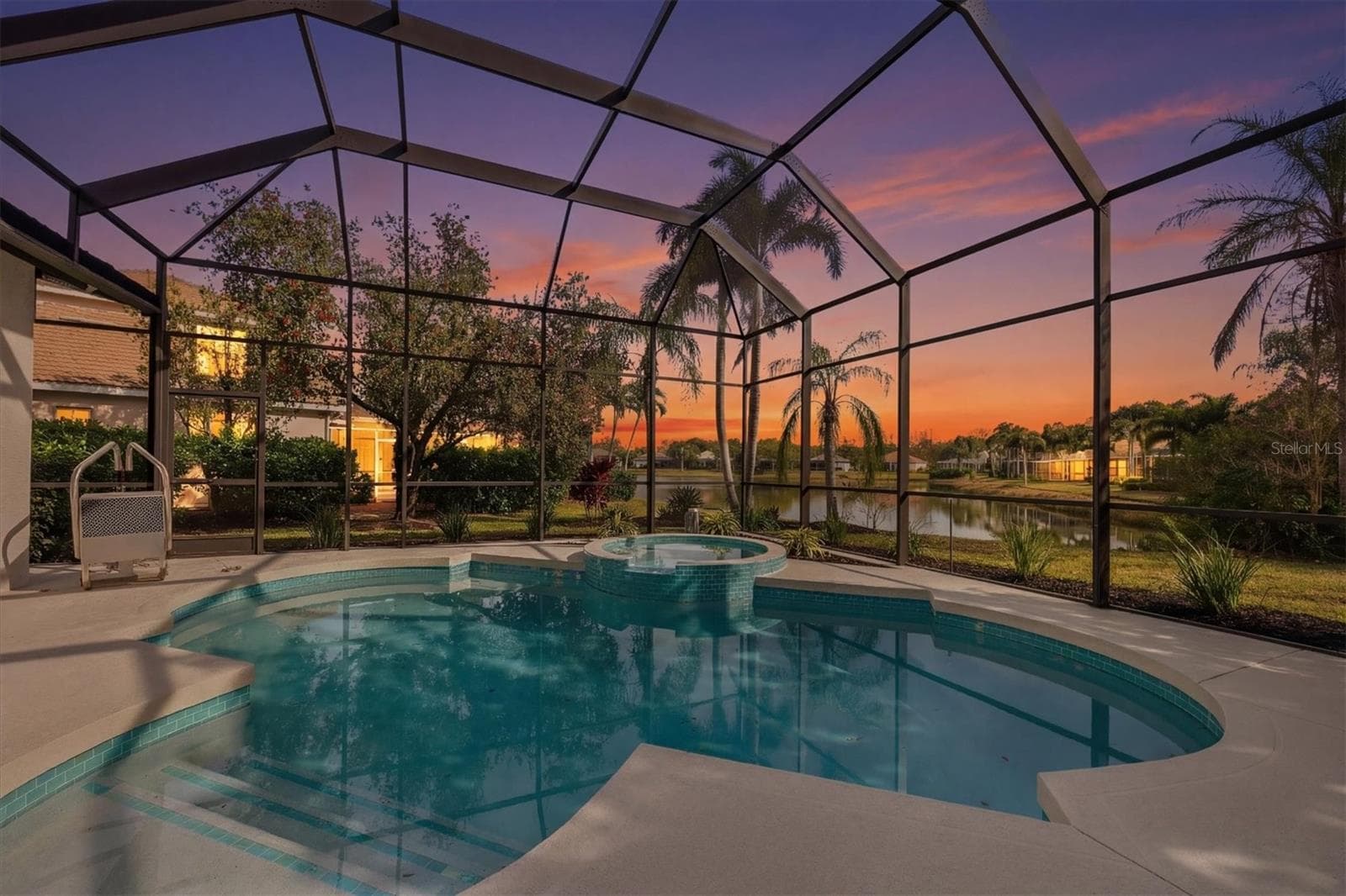 Pool and Lanai View at Twilight - 6922 STANHOPE PL, UNIVERSITY PARK