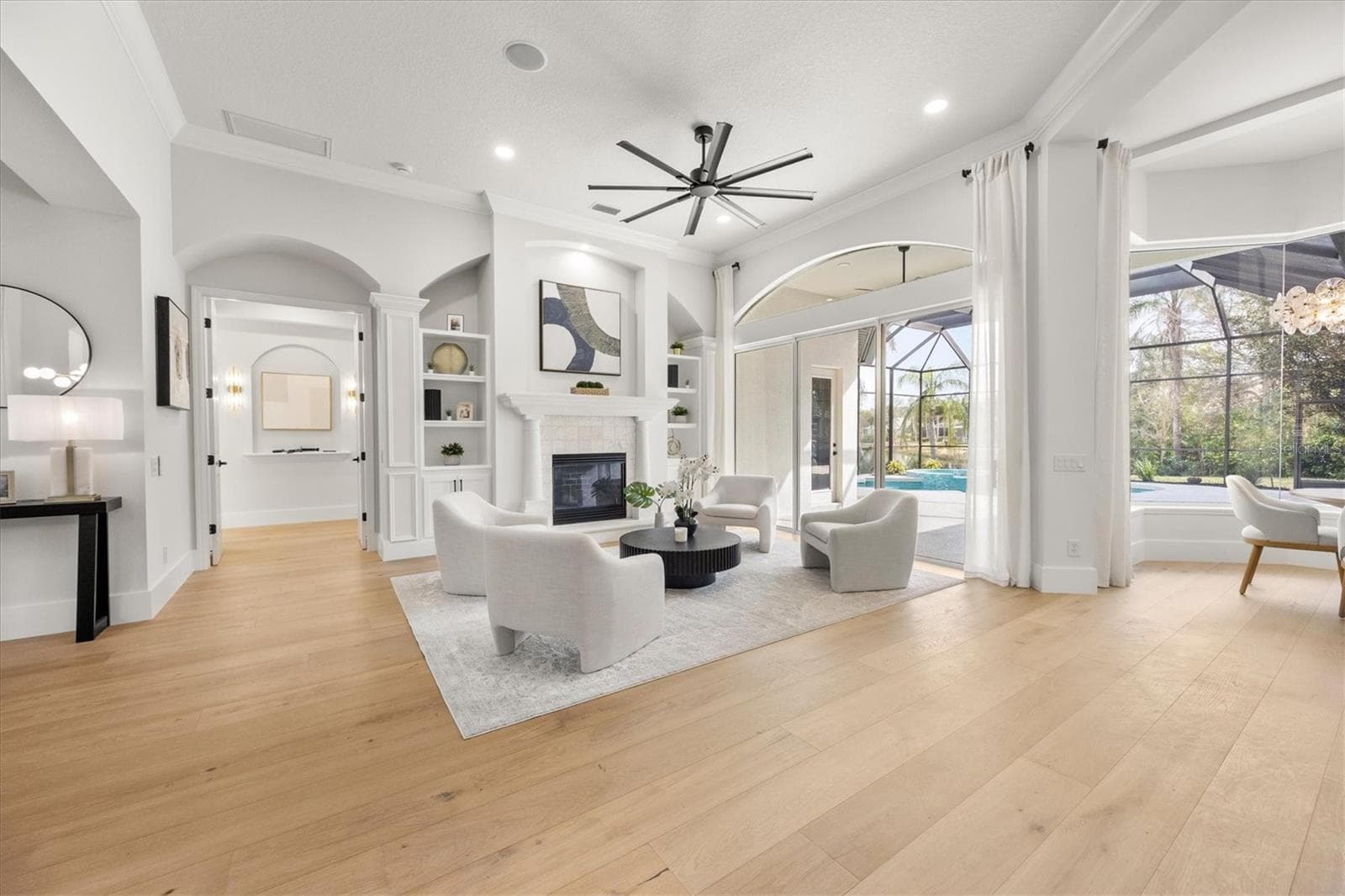 Living Room, Gas Fireplace, Built-ins and White Oak Engineered Wood Flooring - 6922 STANHOPE PL, UNIVERSITY PARK