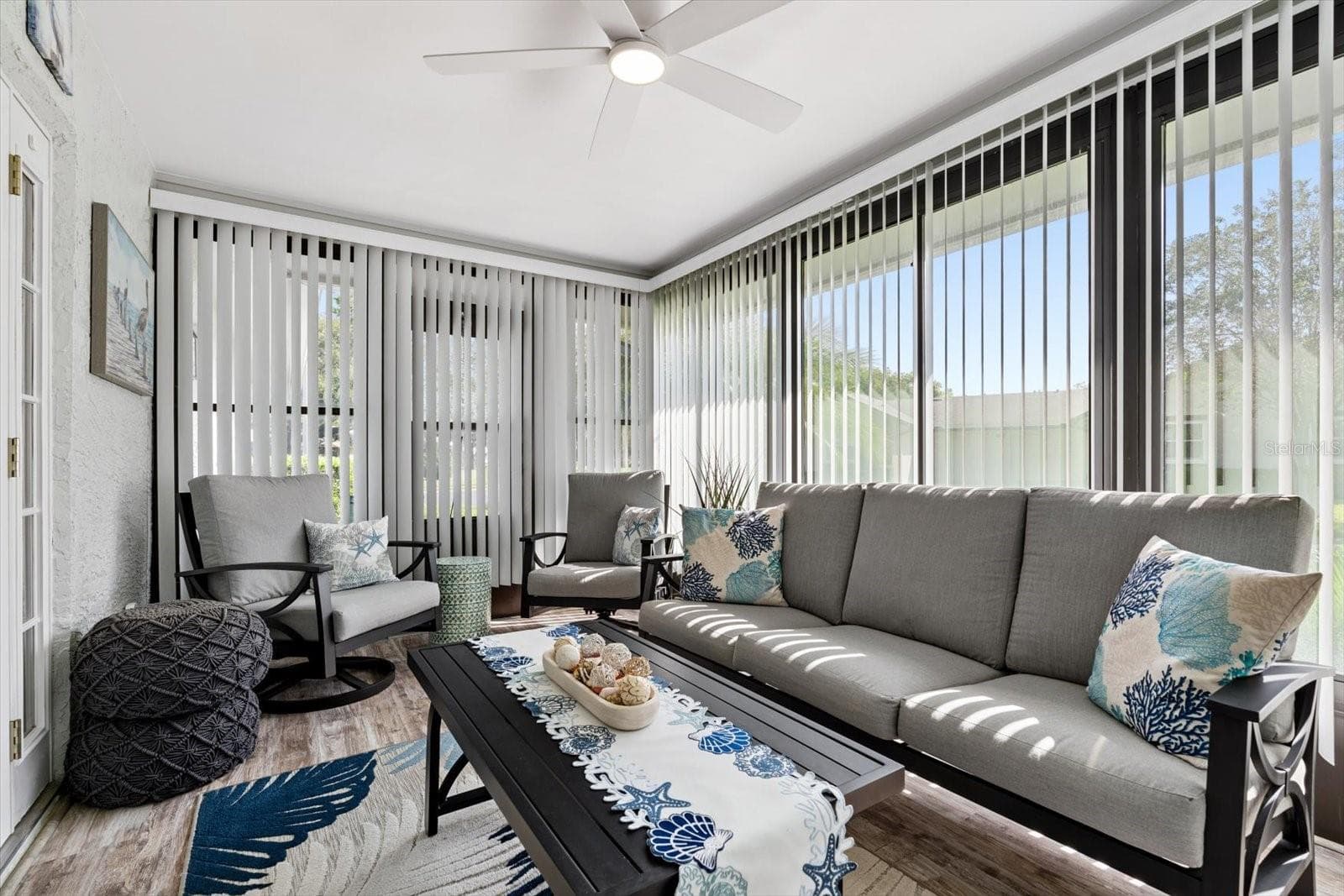 Enclosed lanai with door access to outside - 1307 STONEHAVEN LN, DUNEDIN