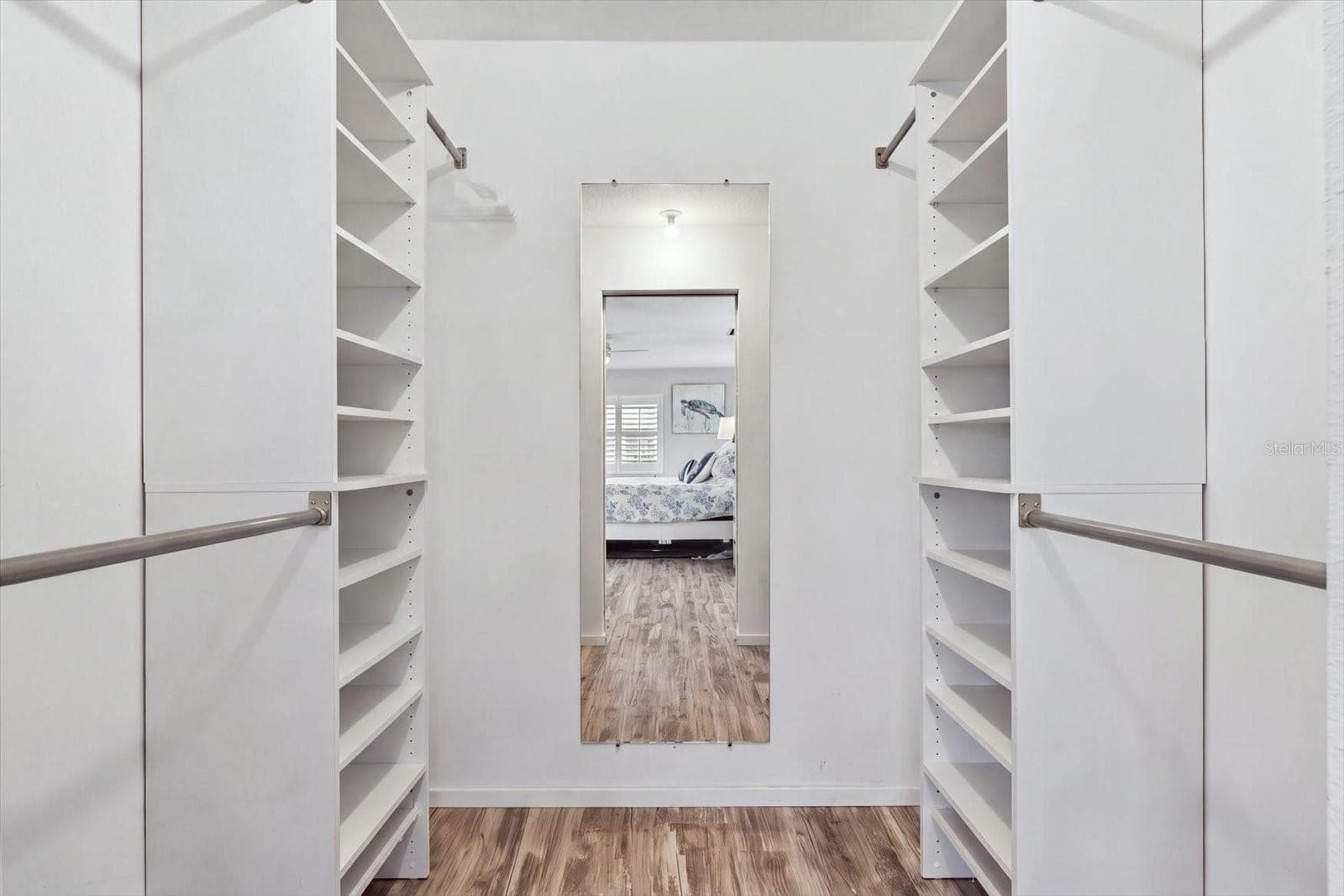 Primary Bedroom Closet with built in shelving - 1307 STONEHAVEN LN, DUNEDIN