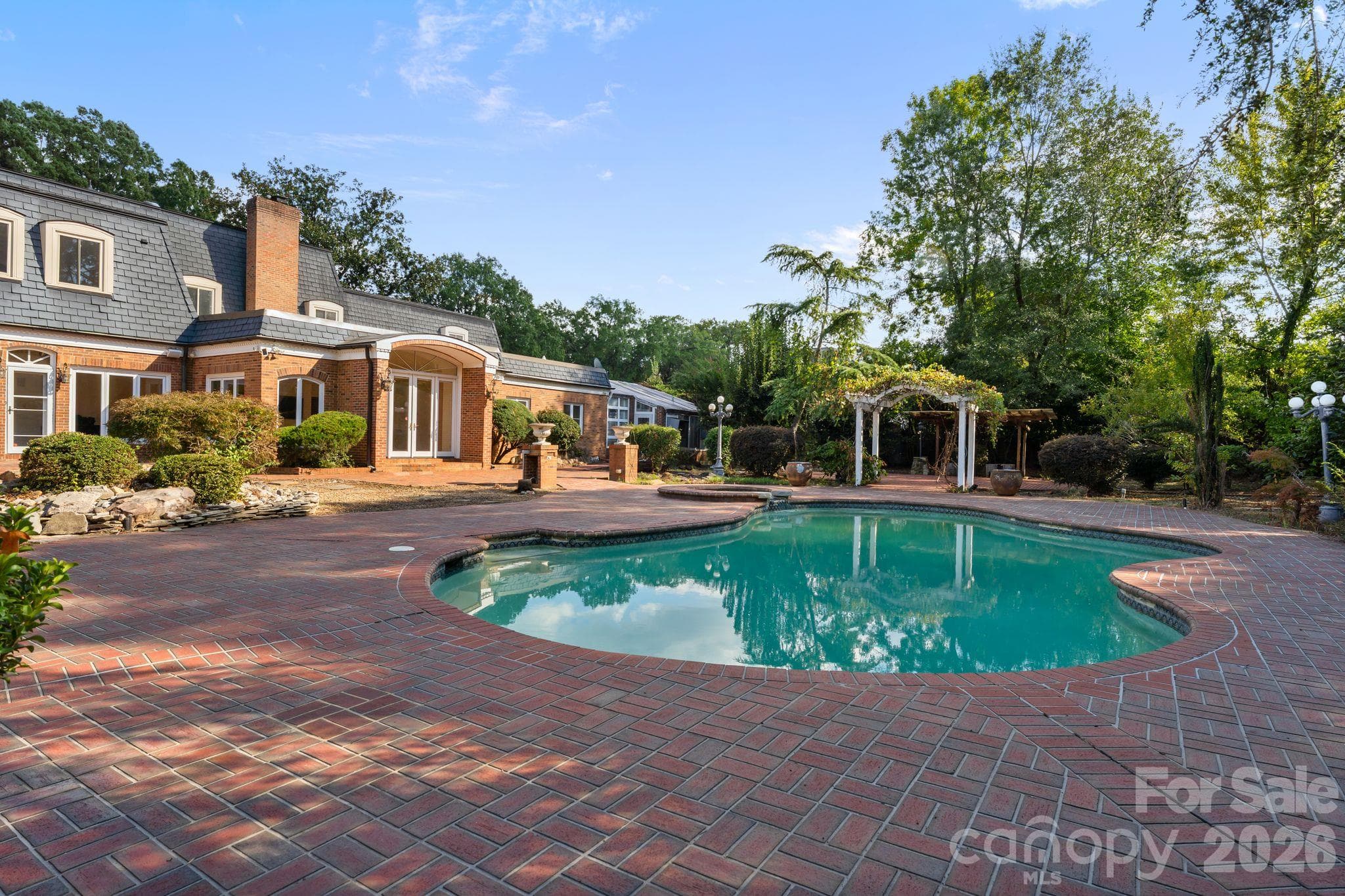 Backyard with pool and spa - 3452 Sharon Road, Charlotte
