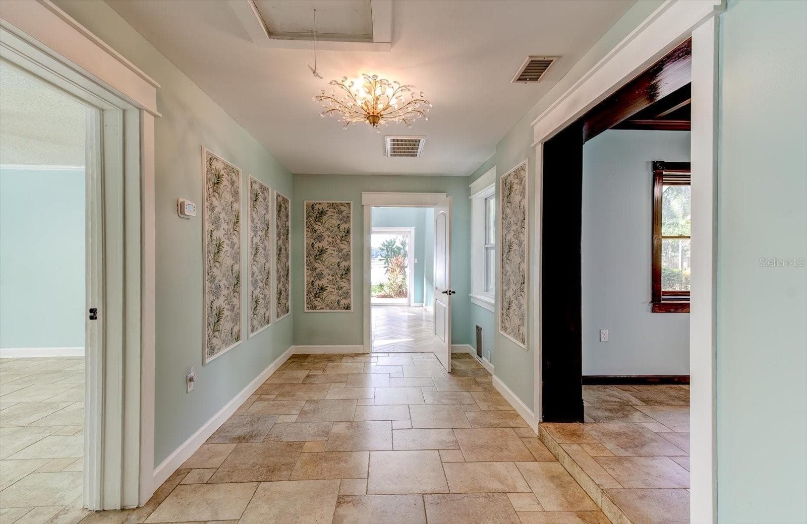 Hallway looking towards Primary Bedroom. Living Room is to the right. - 9793 LAKE GEORGIA DR, ORLANDO