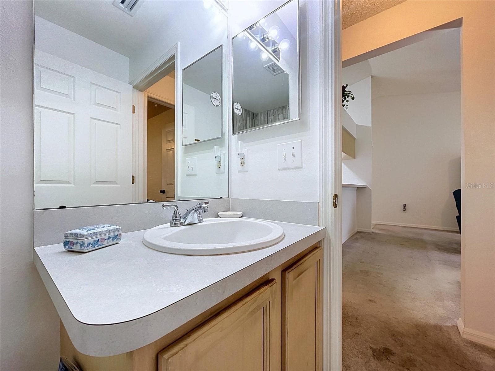 Bath is convenient from Great Room - 27408 CORAL SPRINGS DR, WESLEY CHAPEL