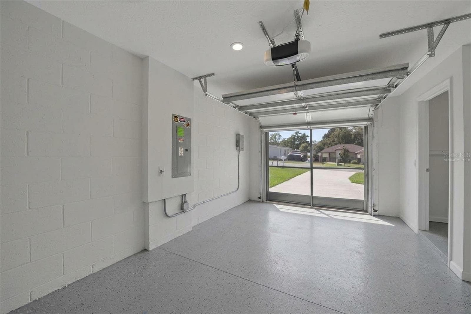 Screened garage - Virtually staged - 26448 BERTRAM RD, BROOKSVILLE