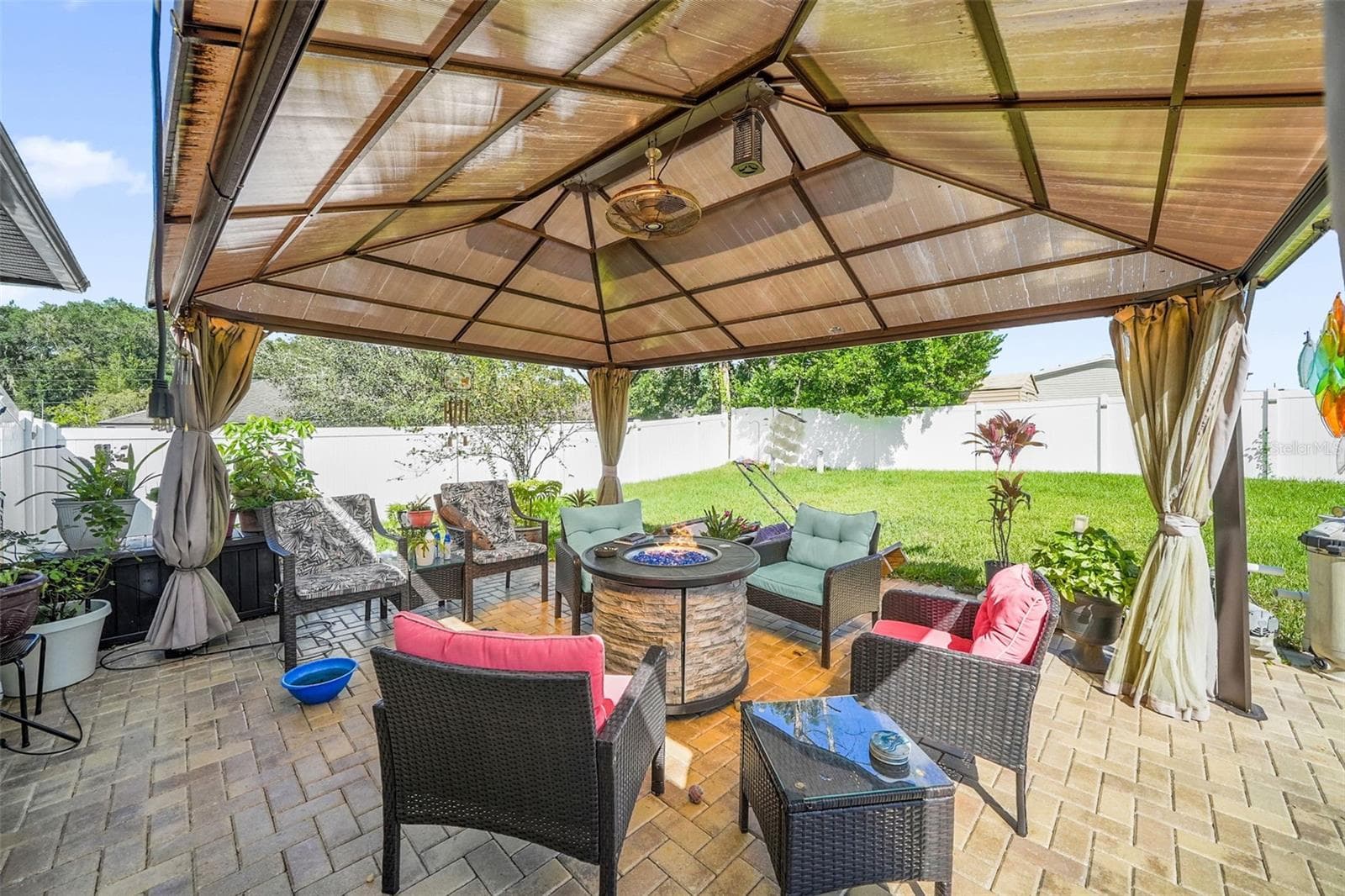 Extended brick paver patio with gazebo - 26448 BERTRAM RD, BROOKSVILLE