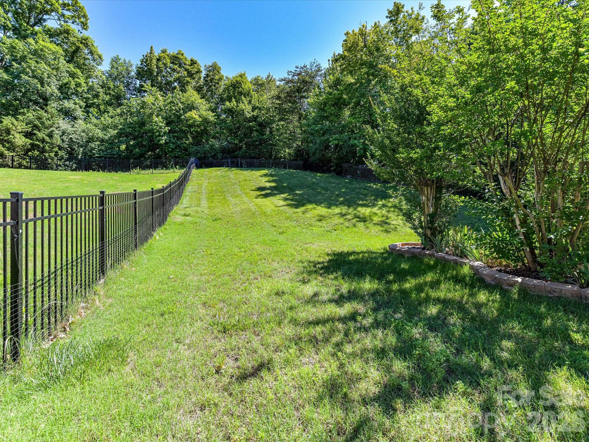 Enjoy an expansive oversized lot with mature trees, lush landscaping, and plenty of space for outdoor entertaining, recreation, or simply relaxing in your own private backyard retreat. - 1788 Oakmont Drive, Denver