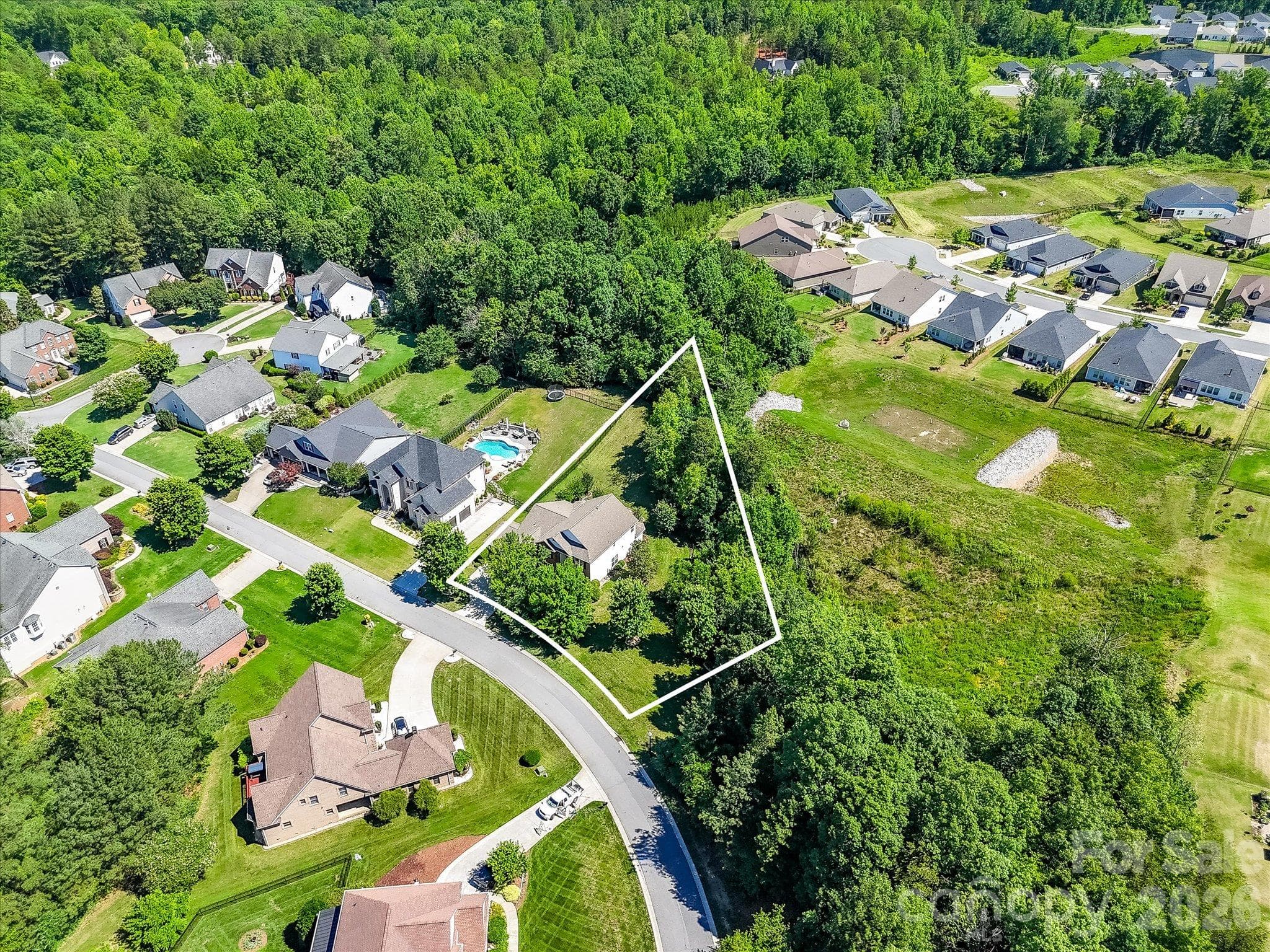 Ideally situated on a premium homesite with a wooded backdrop, offering both privacy and a desirable neighborhood location. - 1788 Oakmont Drive, Denver