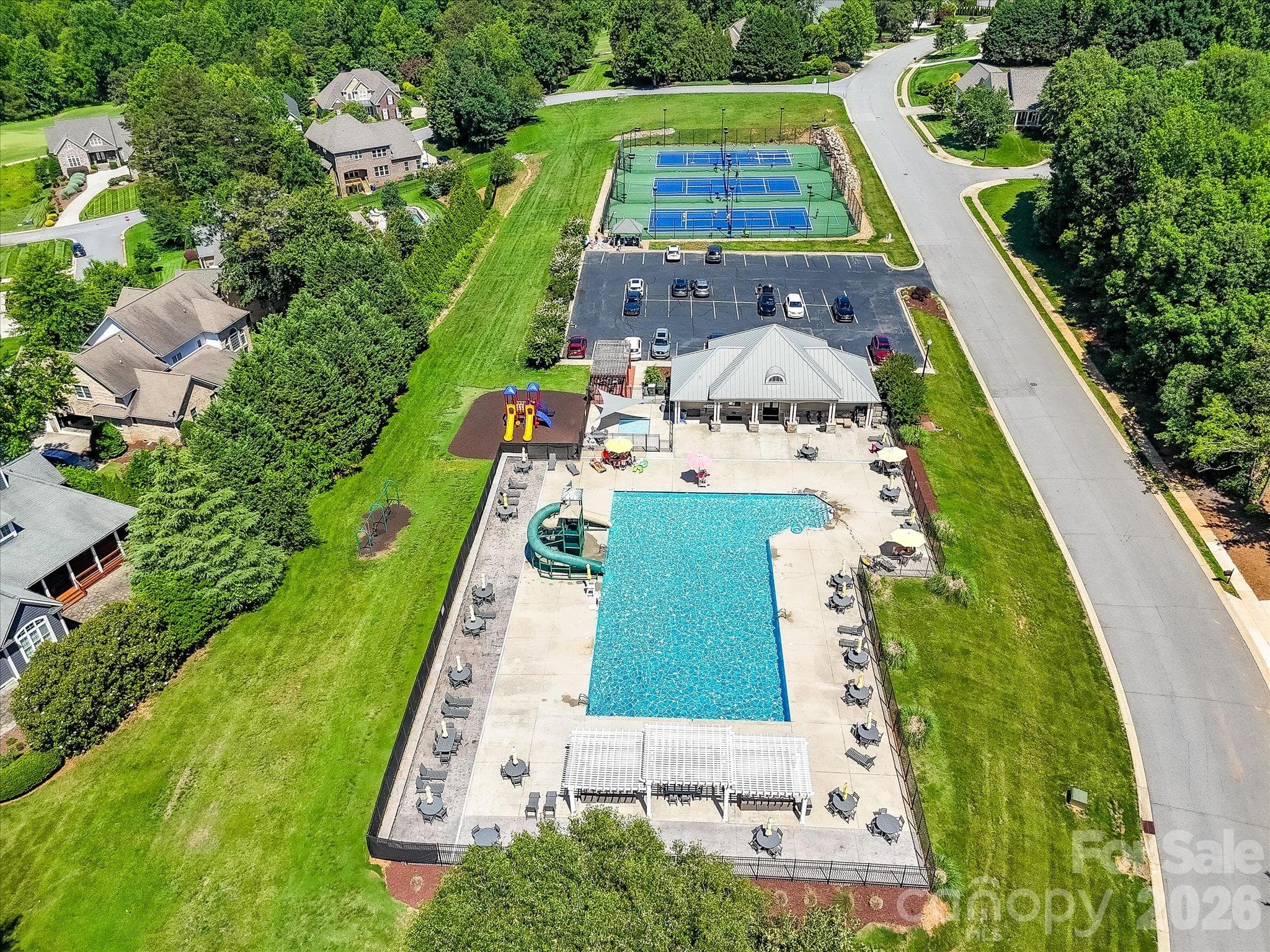 Neighborhood amenities include a resort-style pool, playground, and tennis courts, providing fun and recreation for all ages. - 1788 Oakmont Drive, Denver