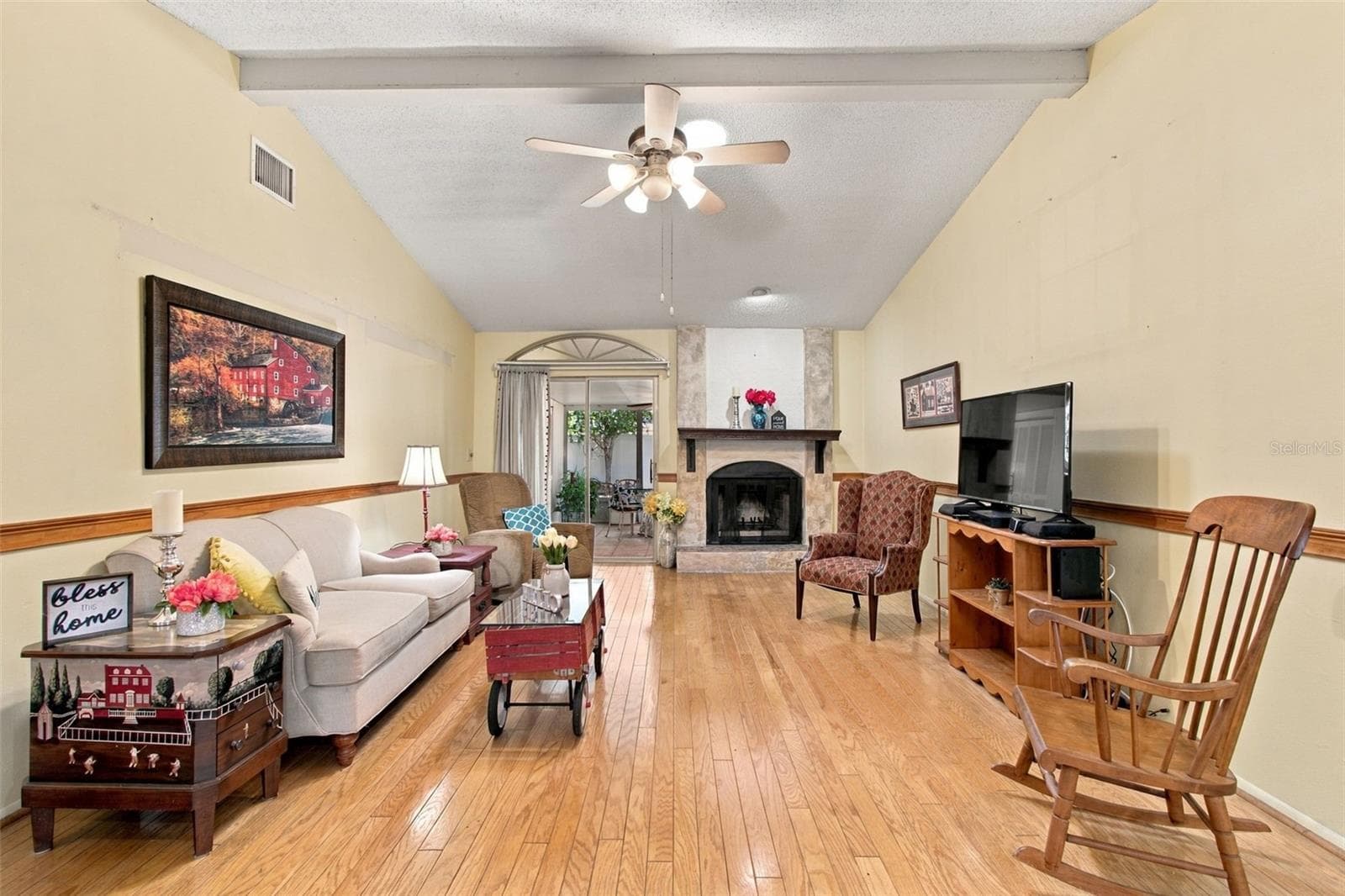 You will love the large living area with a beautiful fireplace, views of your covered patio. - 13020 LEVERINGTON ST, TAMPA