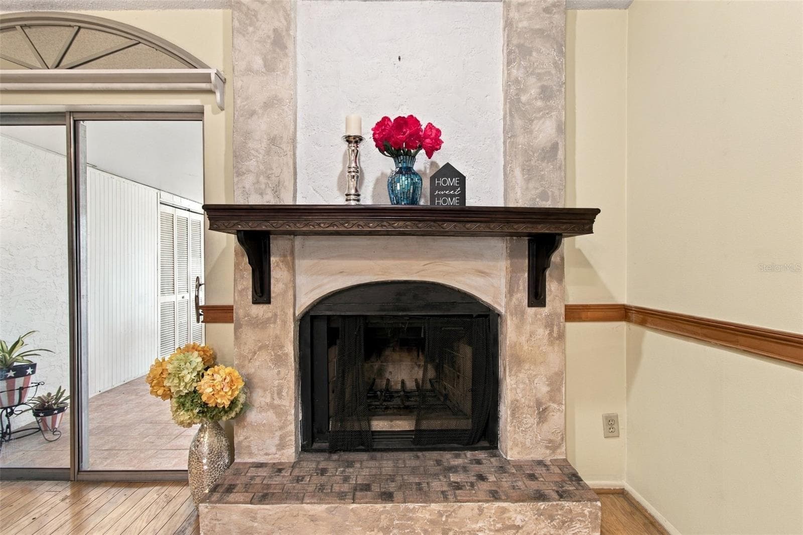 Your fireplace is custom designed with a gorgeous mantle and trim. - 13020 LEVERINGTON ST, TAMPA