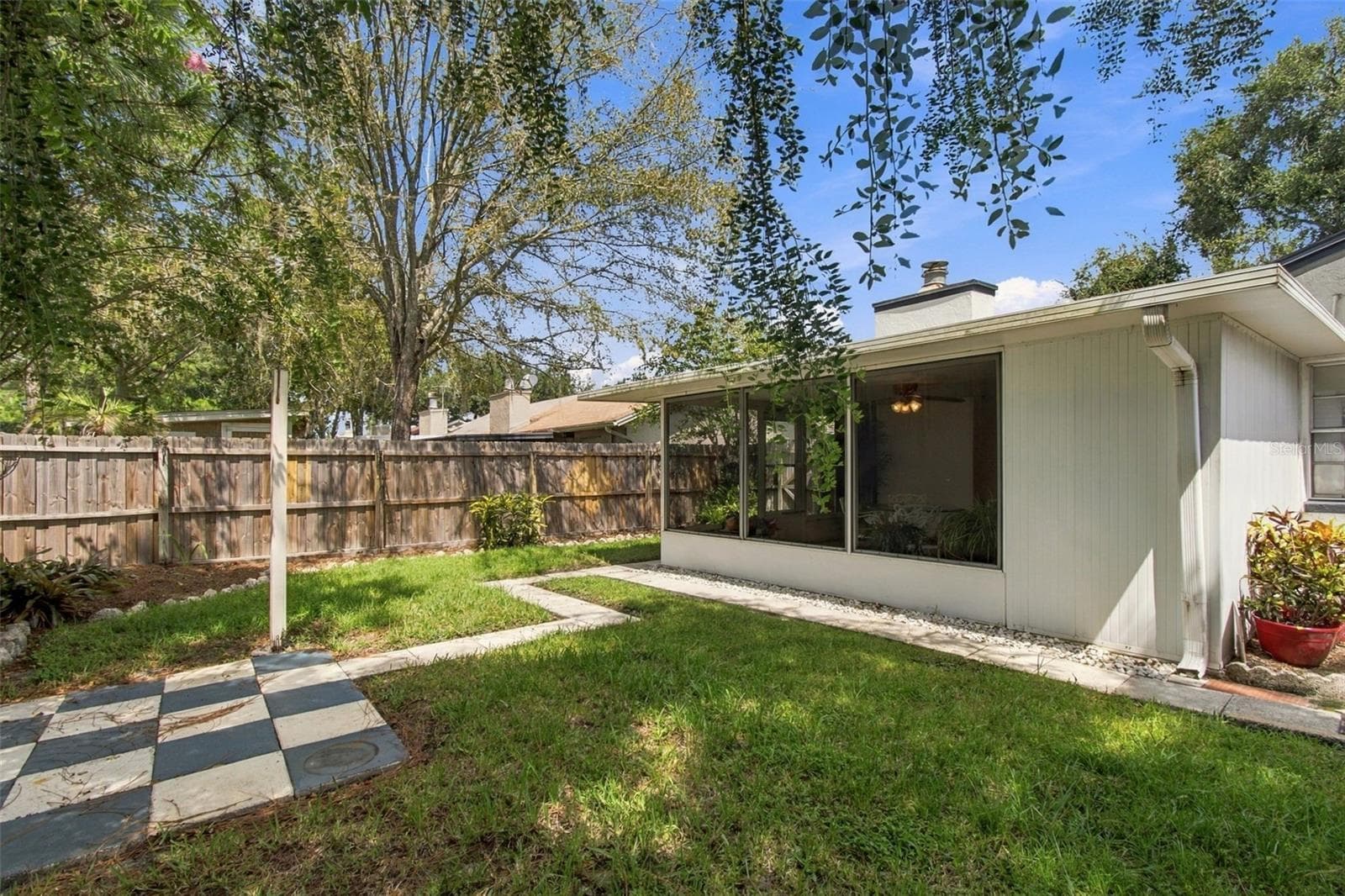 Your large backyard will be perfect for entertaining. - 13020 LEVERINGTON ST, TAMPA