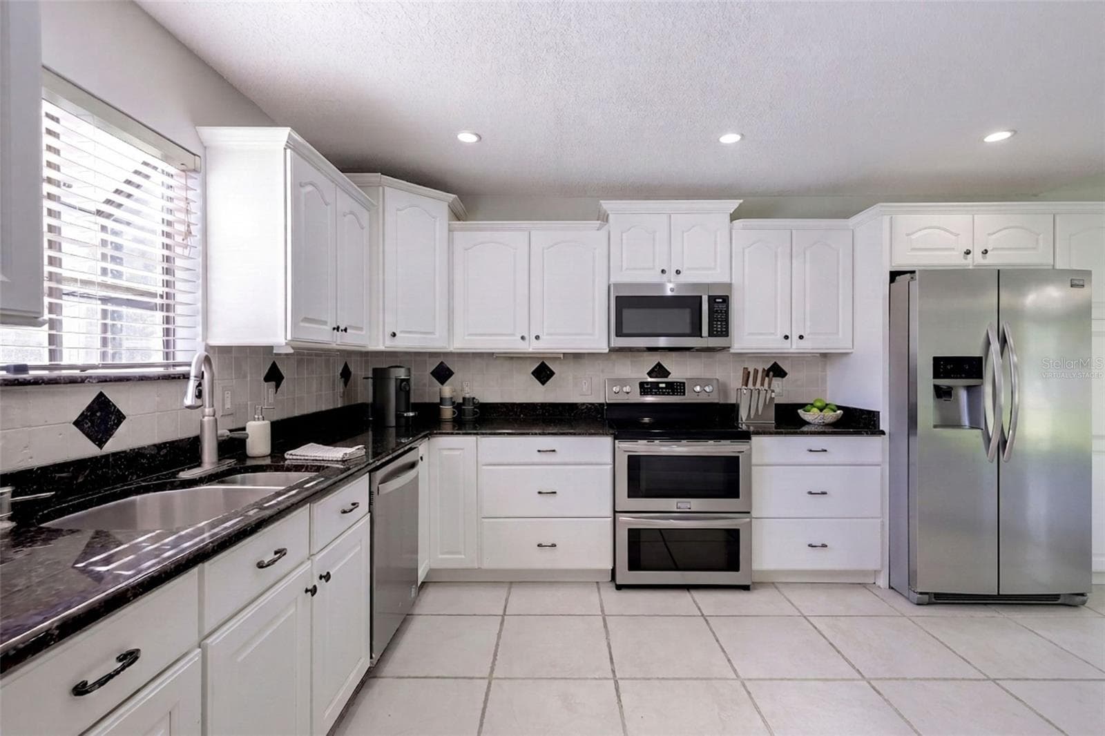 Kitchen - virtually staged - 954 NIBLICK DR, CASSELBERRY
