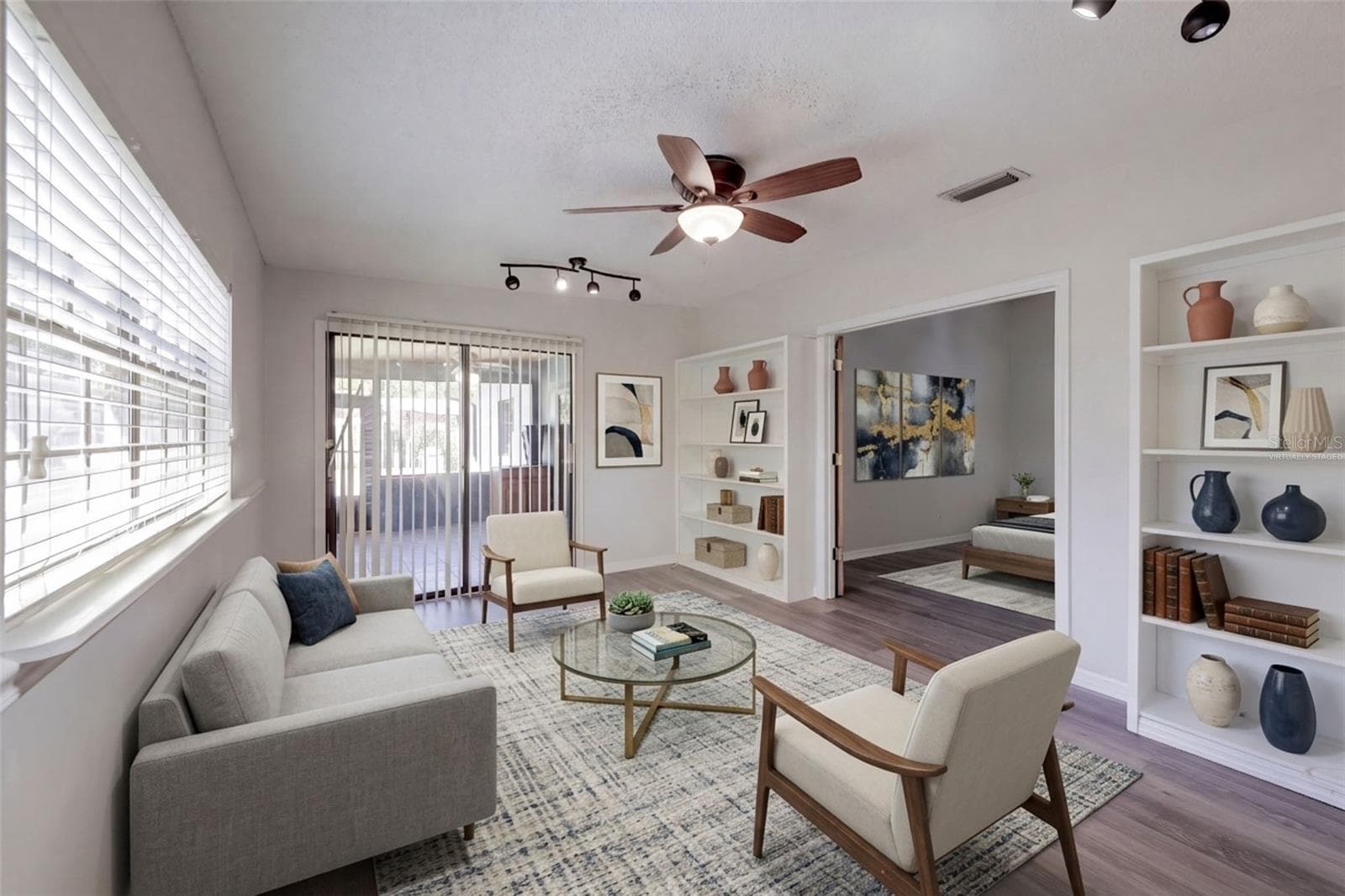 Florida room off master bedroom - virtually staged as a sitting area. - 954 NIBLICK DR, CASSELBERRY