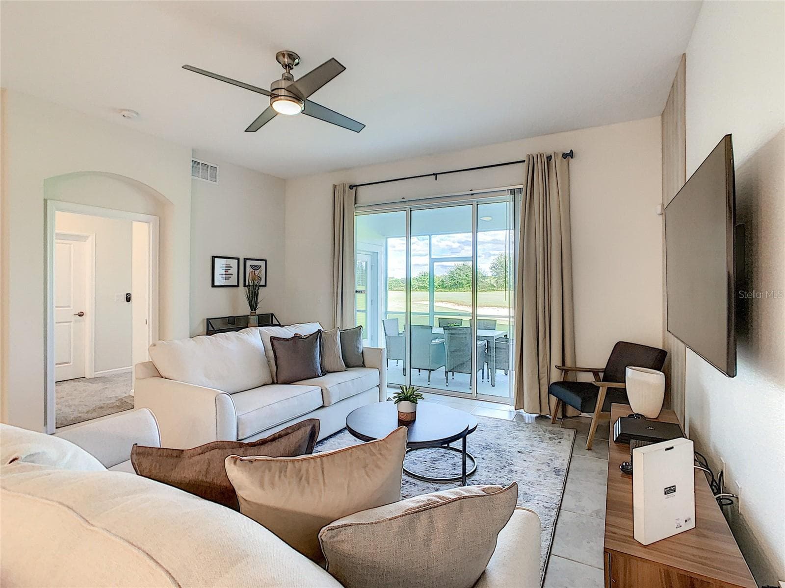 Living Room Patio View - 763 OCEAN COURSE AVE., CHAMPIONS GATE