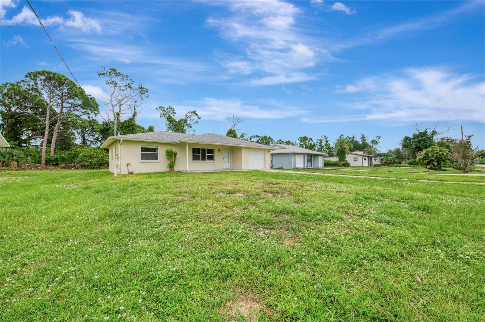 Home sits back off the main road. - 1331 TUDOR RD, ENGLEWOOD