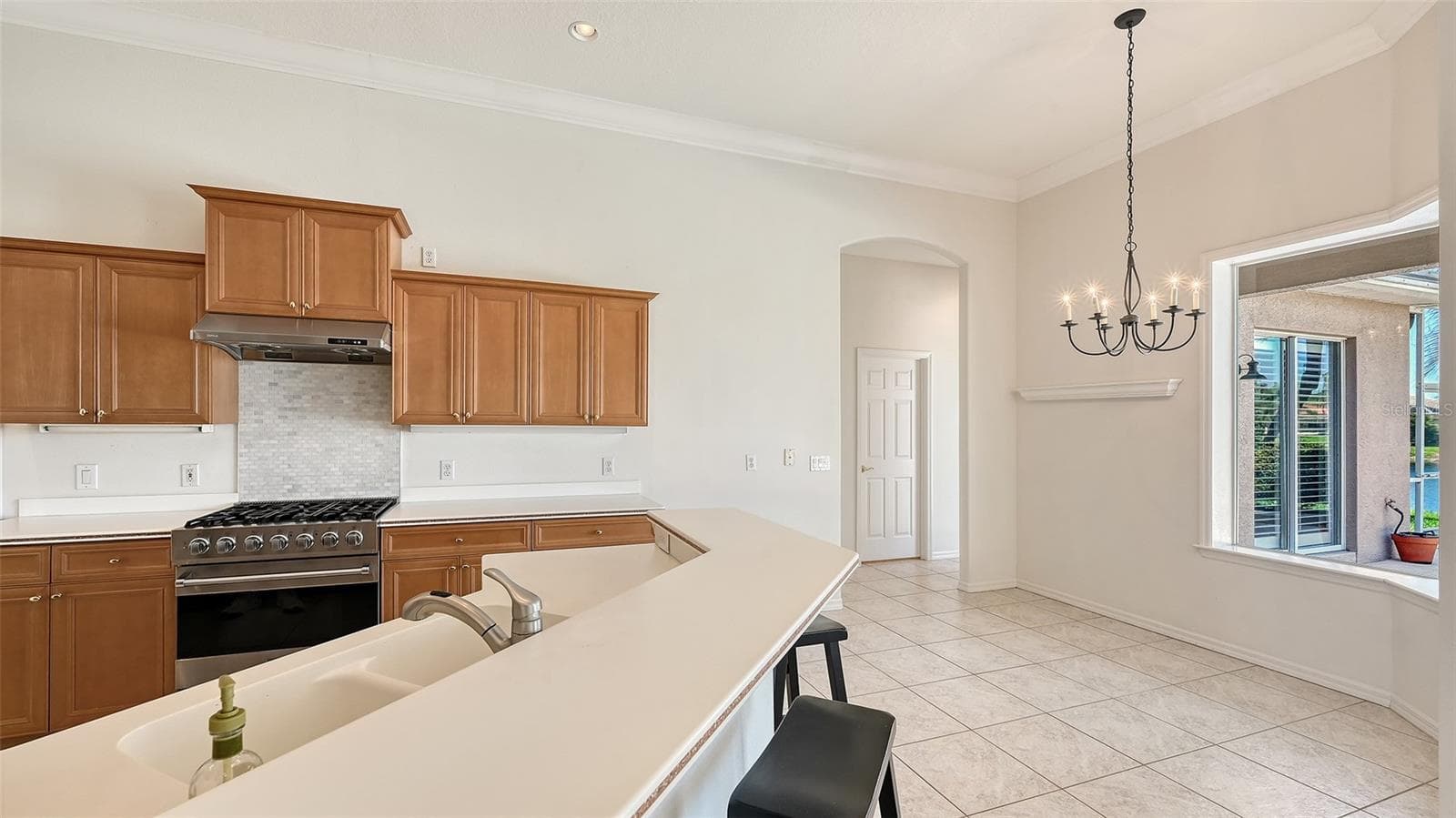 Informal eating in Kitchen with  pool view - 335 PARK TRACE BLVD, OSPREY