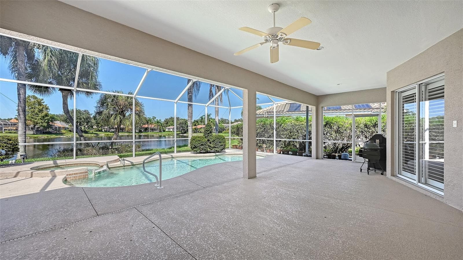 Expanded Lanai with 32 X 24 covered sitting space - Great for entertaining - 335 PARK TRACE BLVD, OSPREY