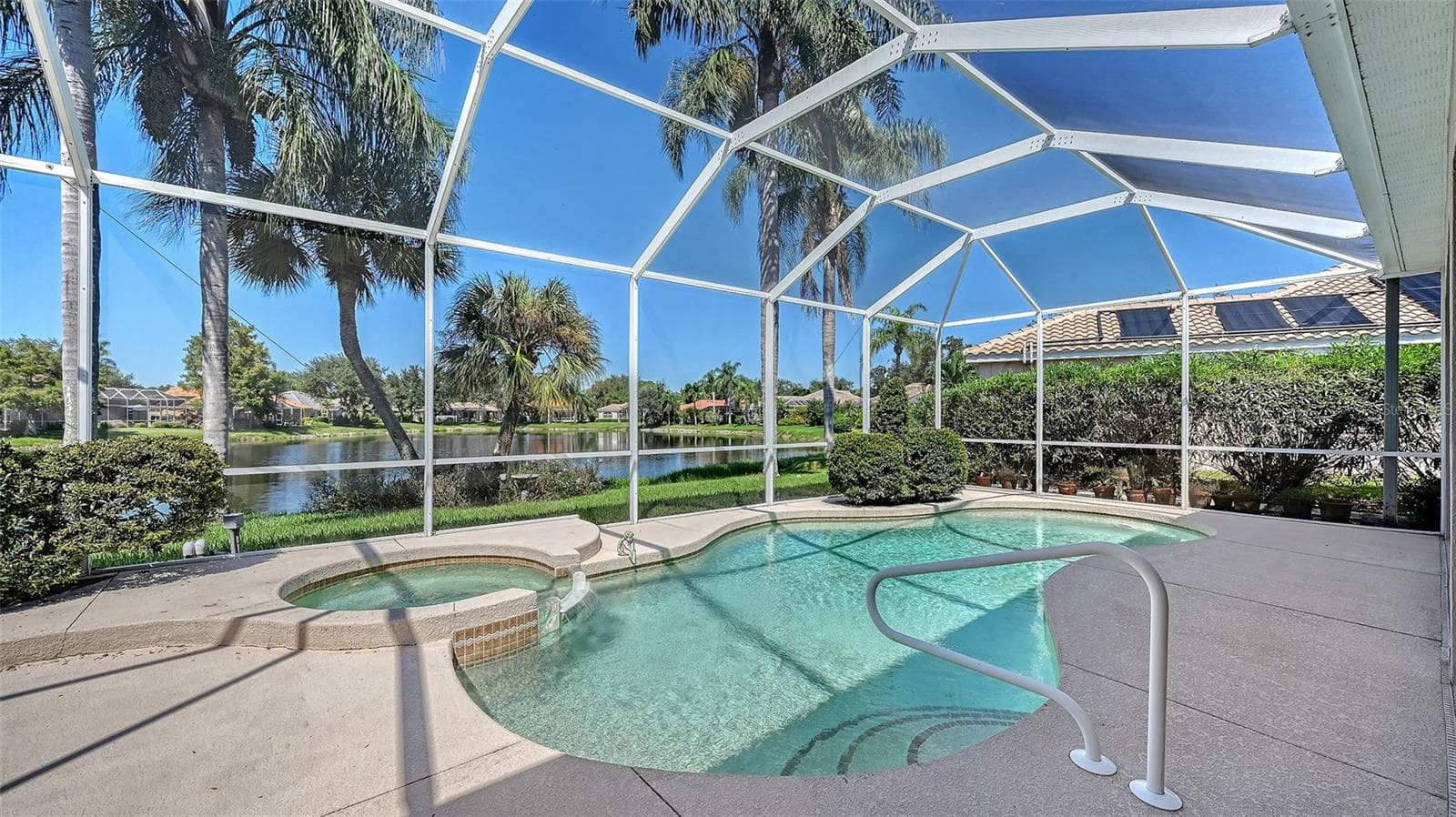 Large Lanai with great water view - 335 PARK TRACE BLVD, OSPREY