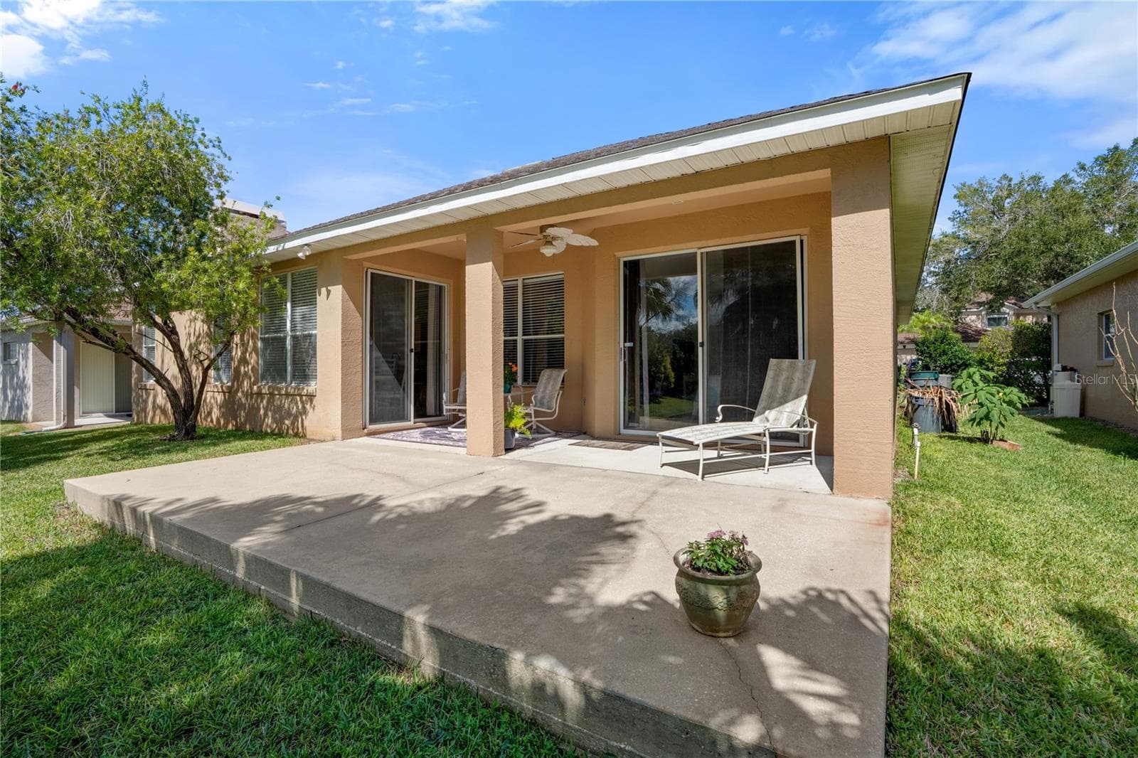 Expanded back porch - 725 TIGRIS LN, LAKE MARY