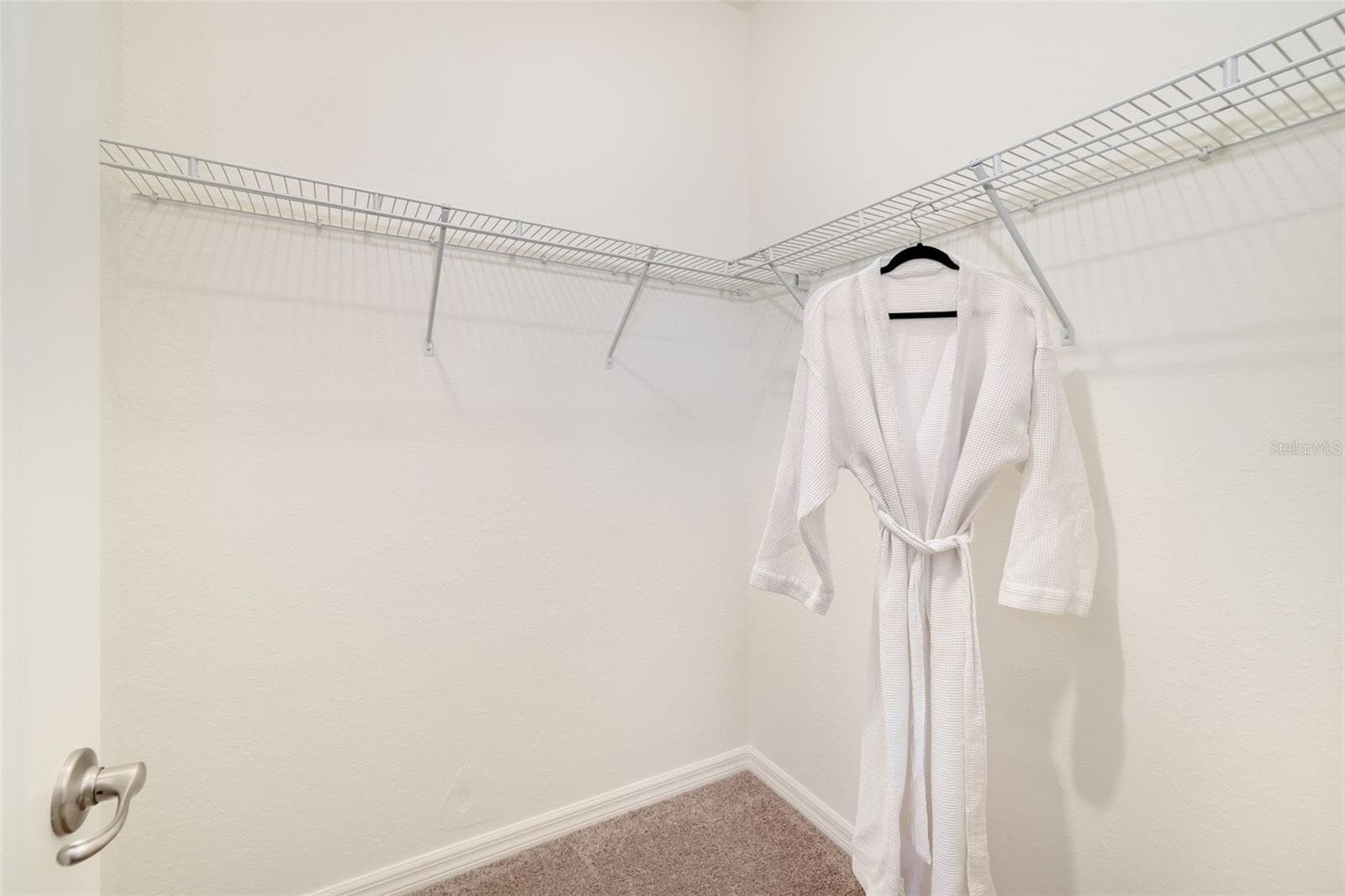 Walk-in closet 1 in primary suite - 4602 ROYAL DORNOCH CIR, BRADENTON