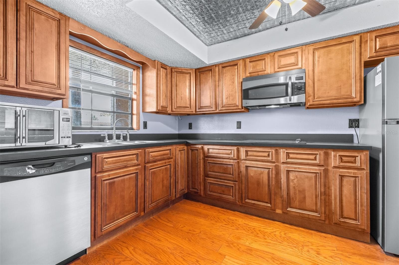 Freshly painted kitchen - 1750 BELLEAIR FOREST DR #A8, BELLEAIR