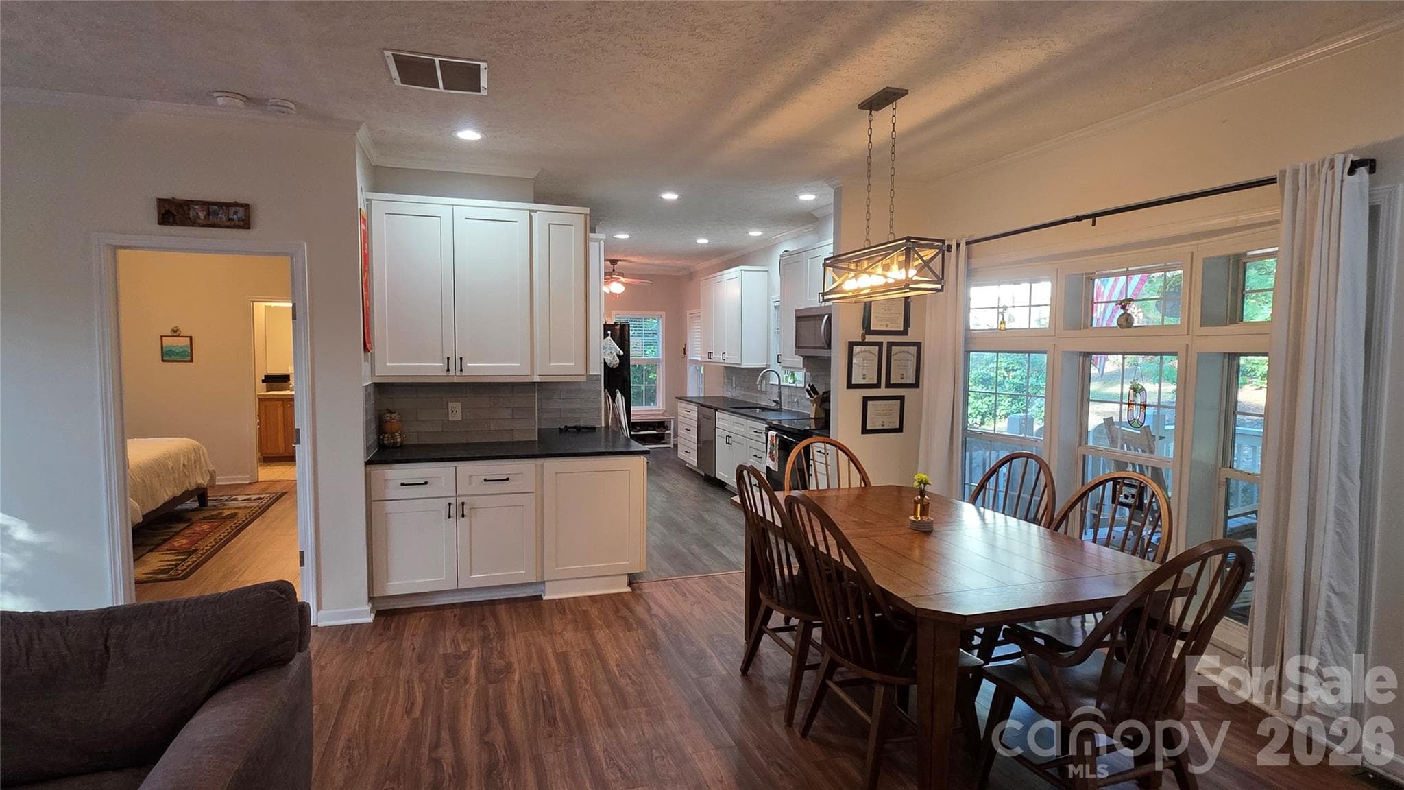 Dining area to the kitchen and mudroom or breakfast area. - 52 Enochs Way Way, Fletcher