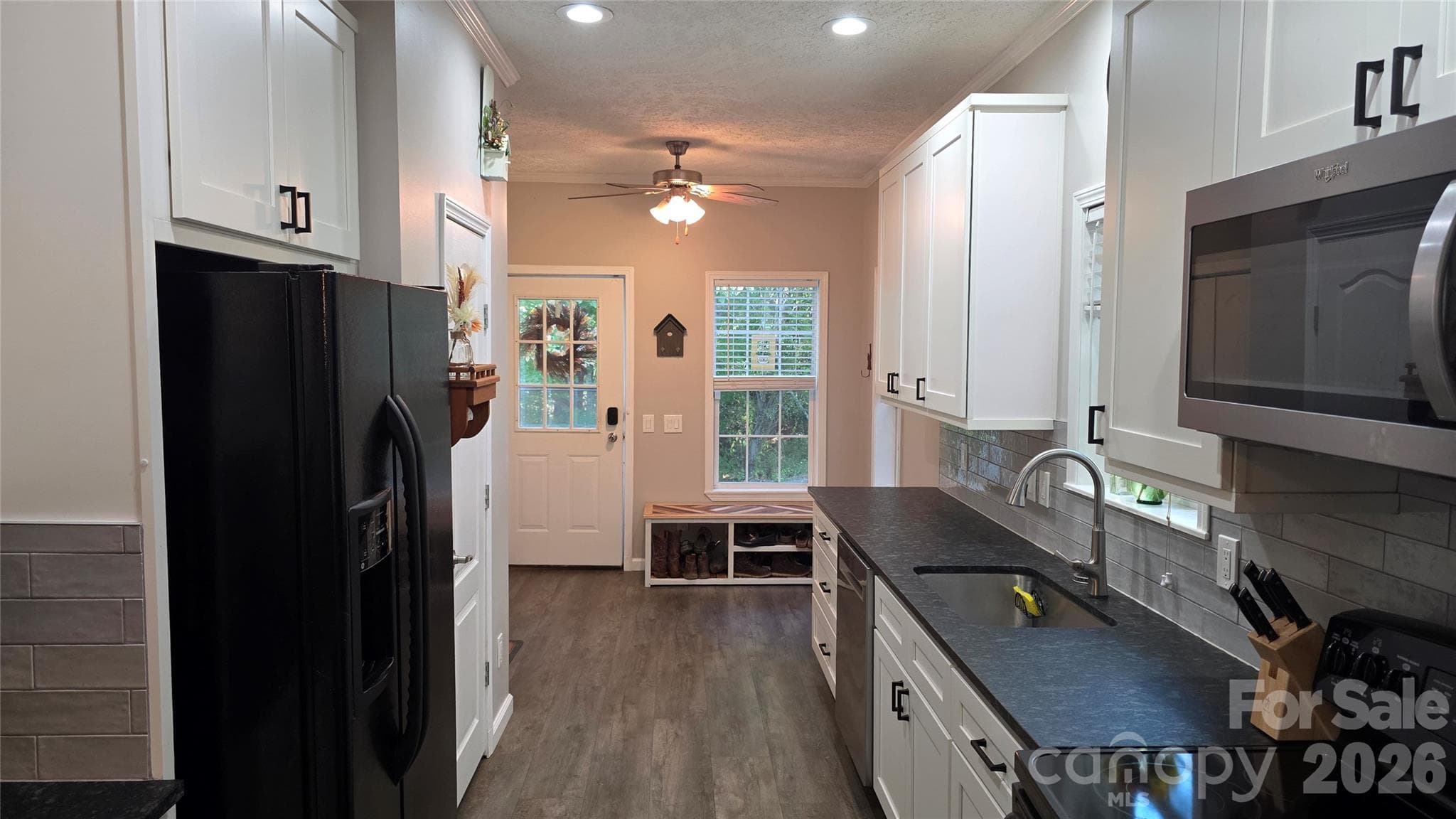 Galley Kitchen with Black Granite Countertops - 52 Enochs Way Way, Fletcher