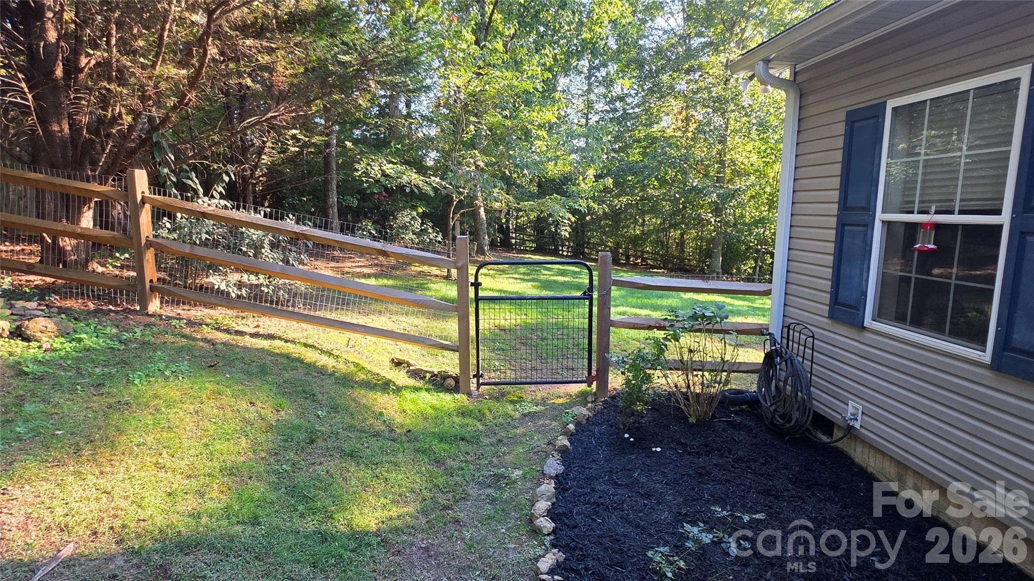Side yard with gate on the for easy access - 52 Enochs Way Way, Fletcher
