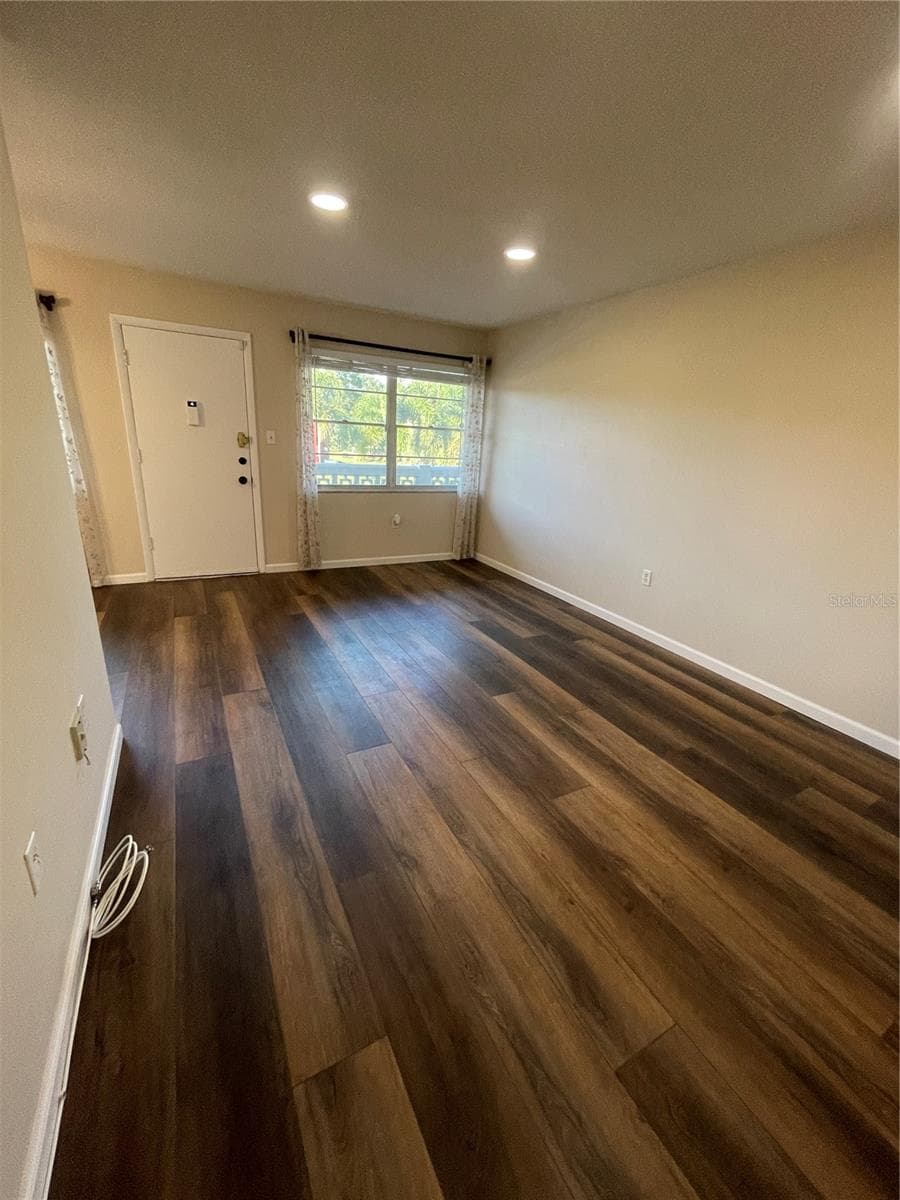 View from Living Room to Front Door - 8101 11TH ST N #217, ST PETERSBURG