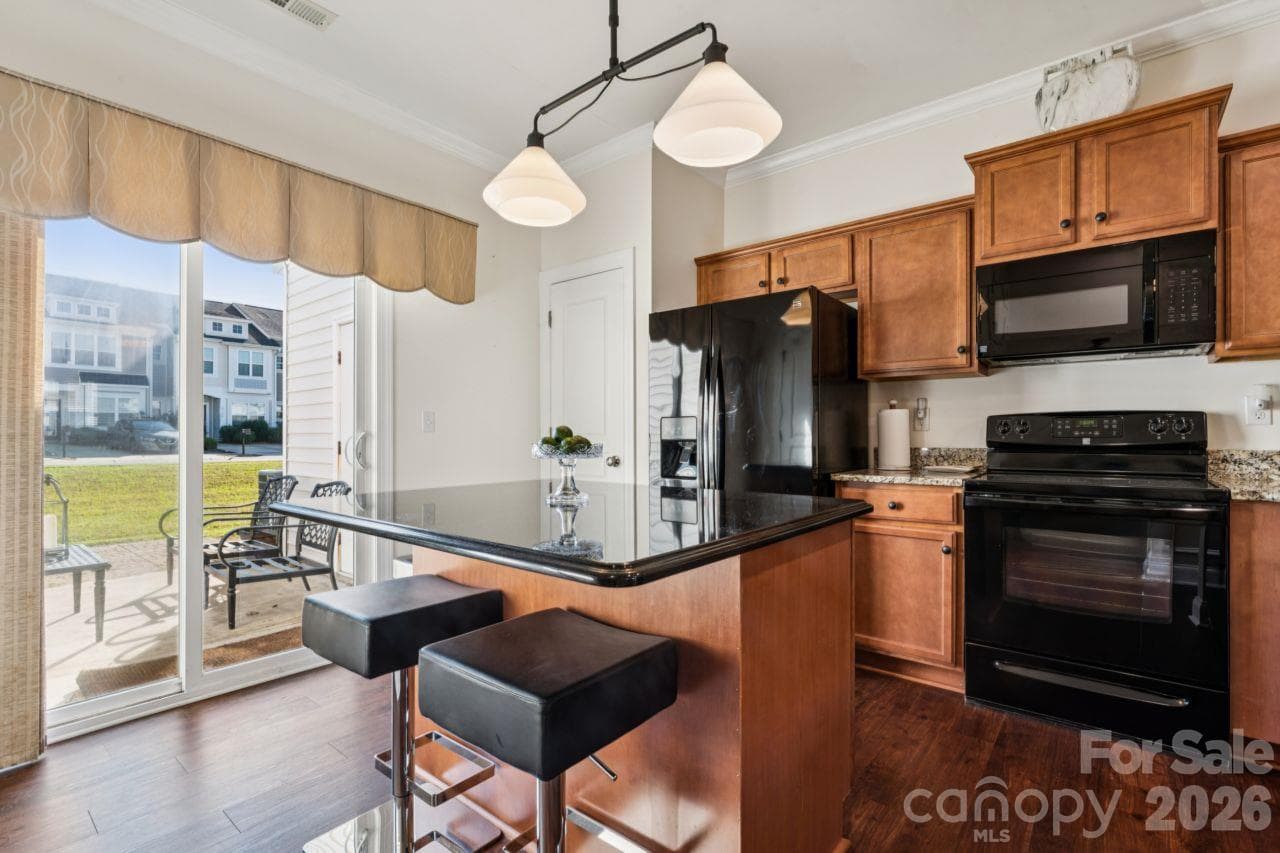 Kitchen with Seated Island - 248 Halton Crossing Drive, Concord