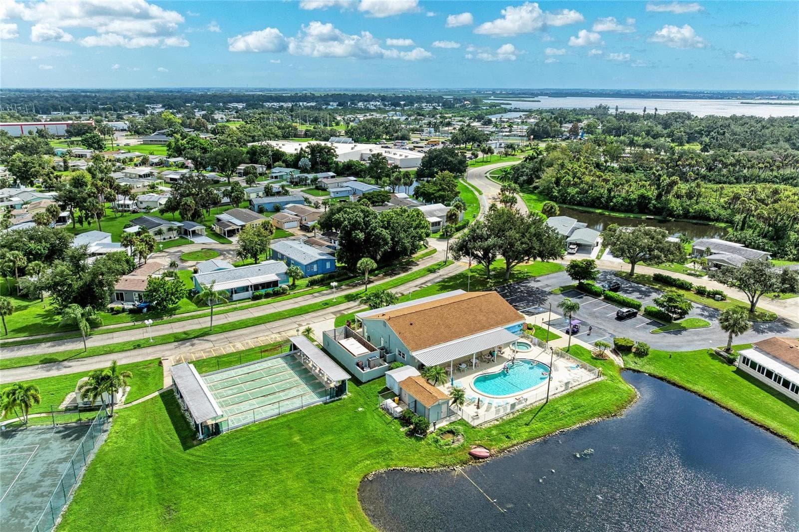 View of clubhouse, shuffleboard courts amd community pool - 42 MEADOWLARK CIR, ELLENTON