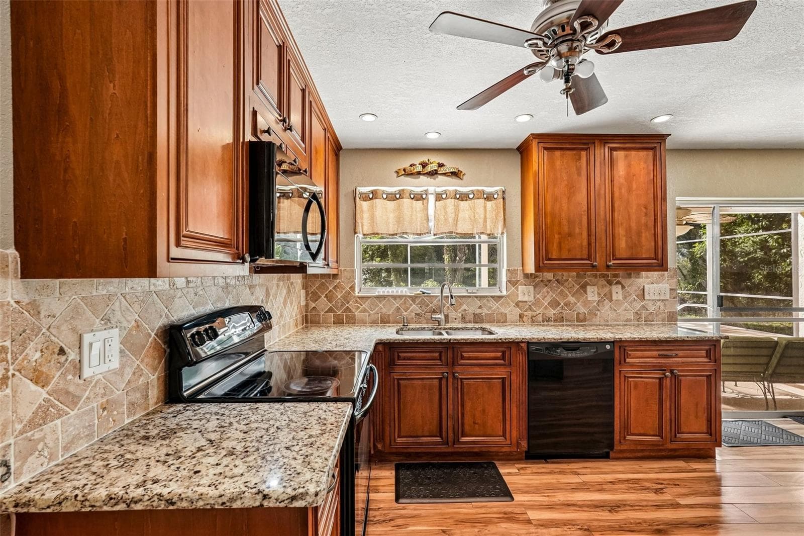 Kitchen with stone counters - 22215 ONEIDA AVE, PORT CHARLOTTE