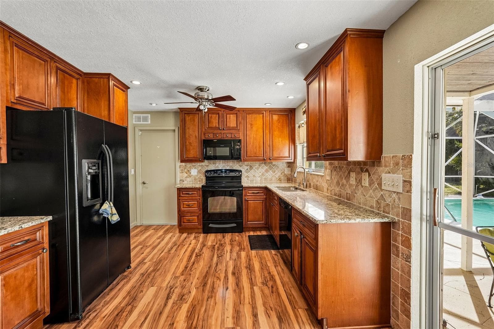 Spacious Open Kitchen - 22215 ONEIDA AVE, PORT CHARLOTTE