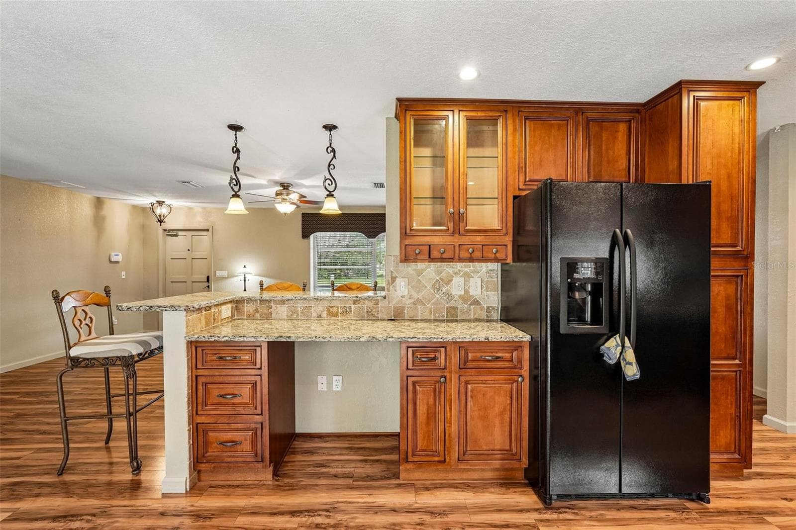 Spacious Open Kitchen with area to sit at bar - 22215 ONEIDA AVE, PORT CHARLOTTE