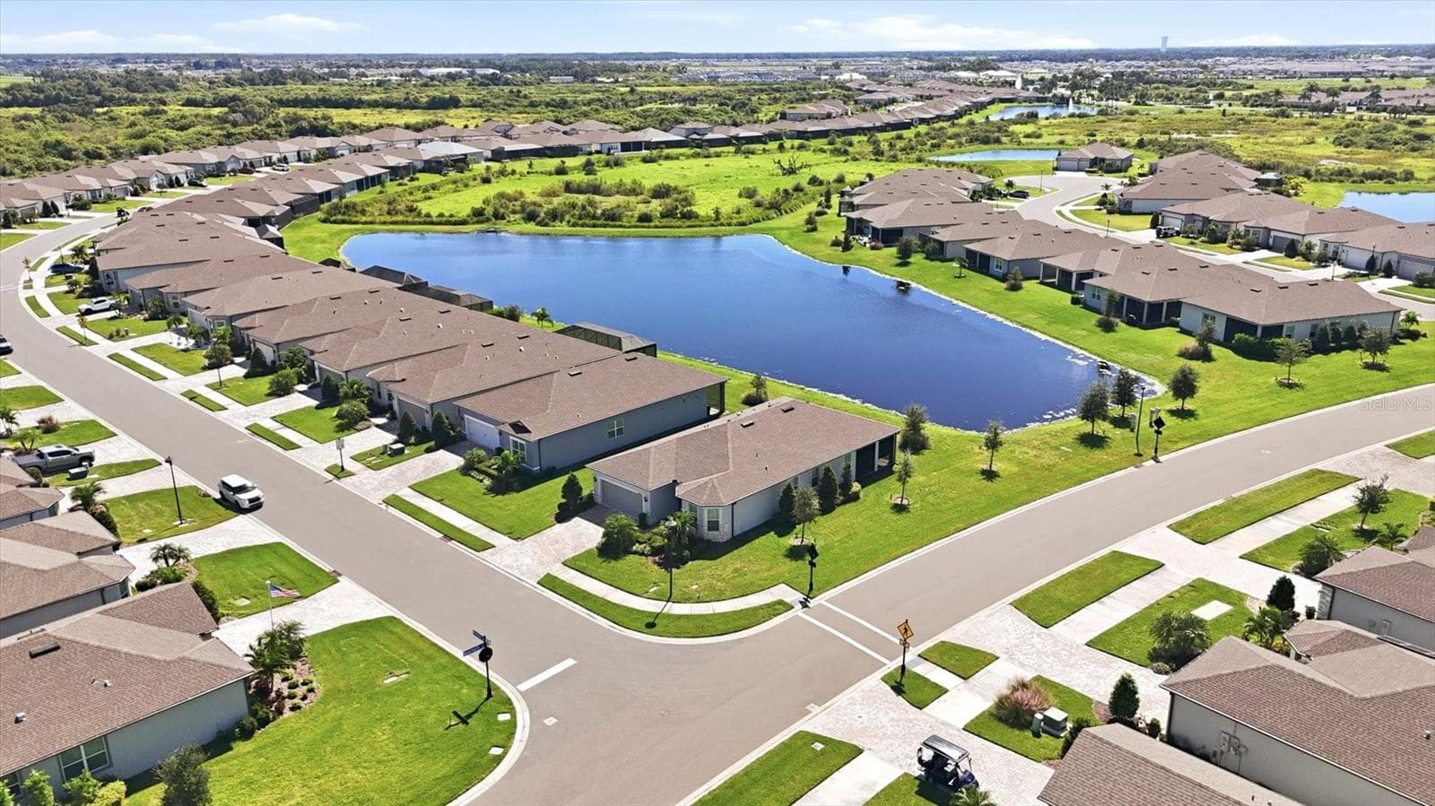 Enjoy a wide corner lot! - 10635 WYNWARD WAY, PARRISH