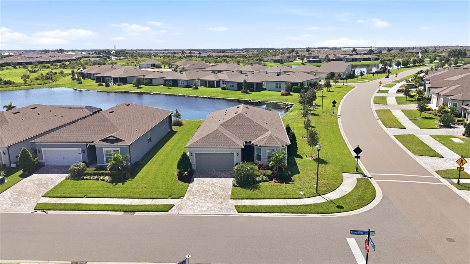 Close to the clubhouse with a pond view! - 10635 WYNWARD WAY, PARRISH