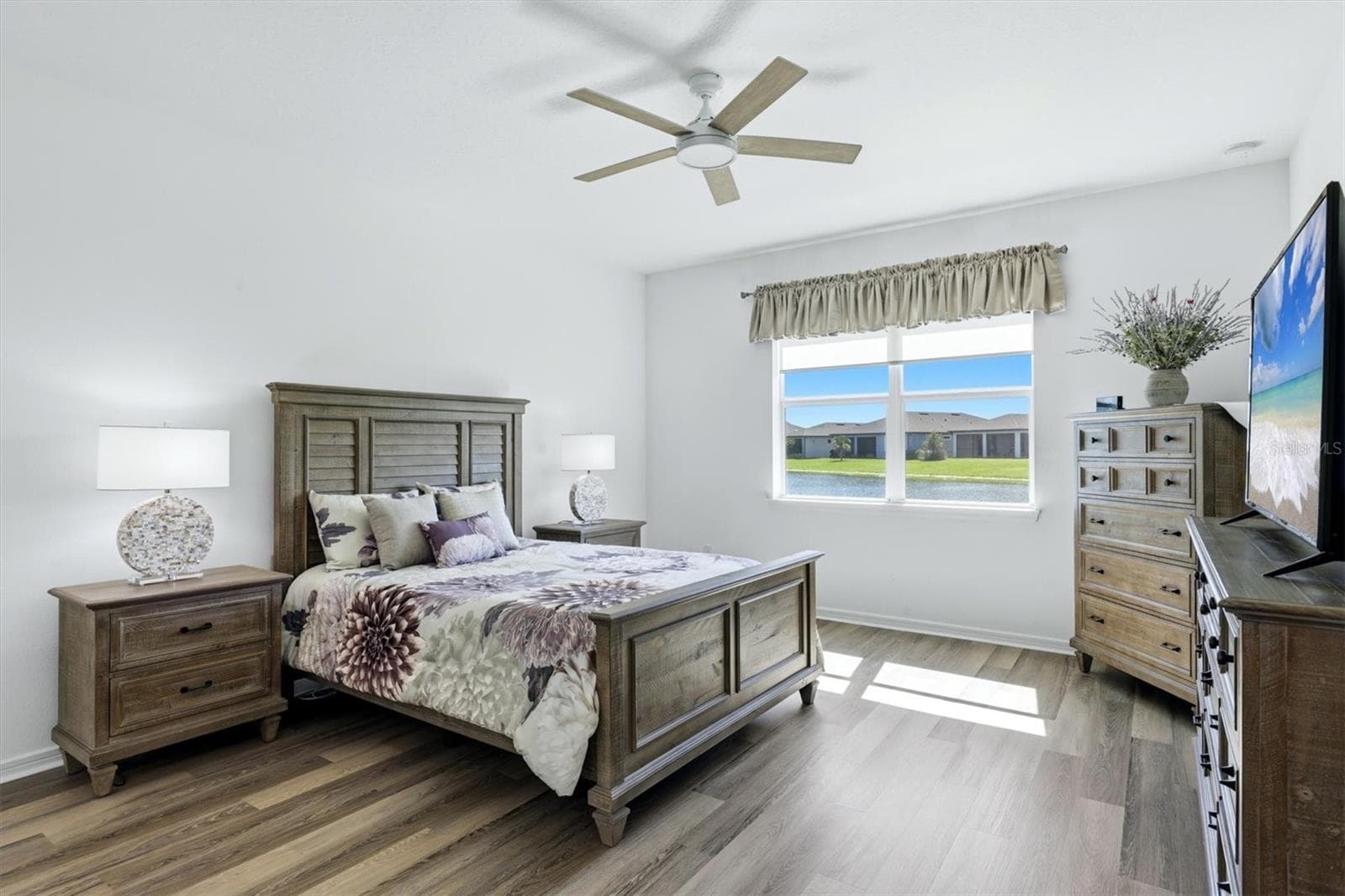 Primary Suite with pond view. Very spacious with newer LPV flooring. - 10635 WYNWARD WAY, PARRISH