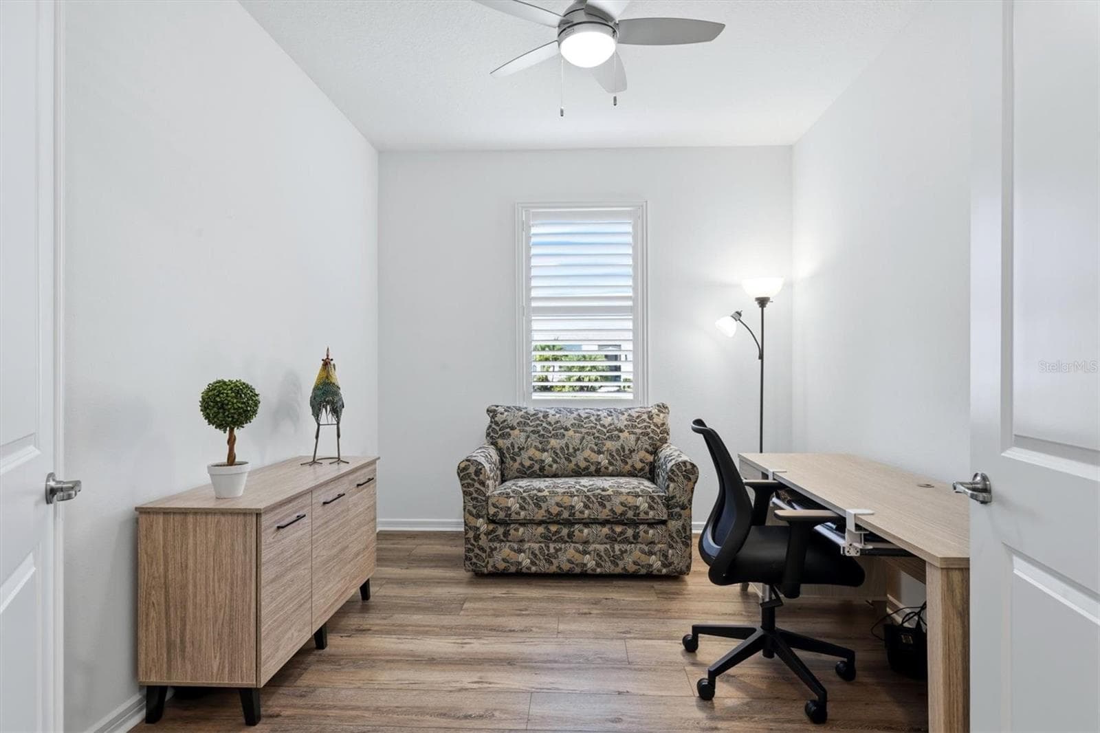 Den with double doors/ feels larger than it appears in the photo! - 10635 WYNWARD WAY, PARRISH