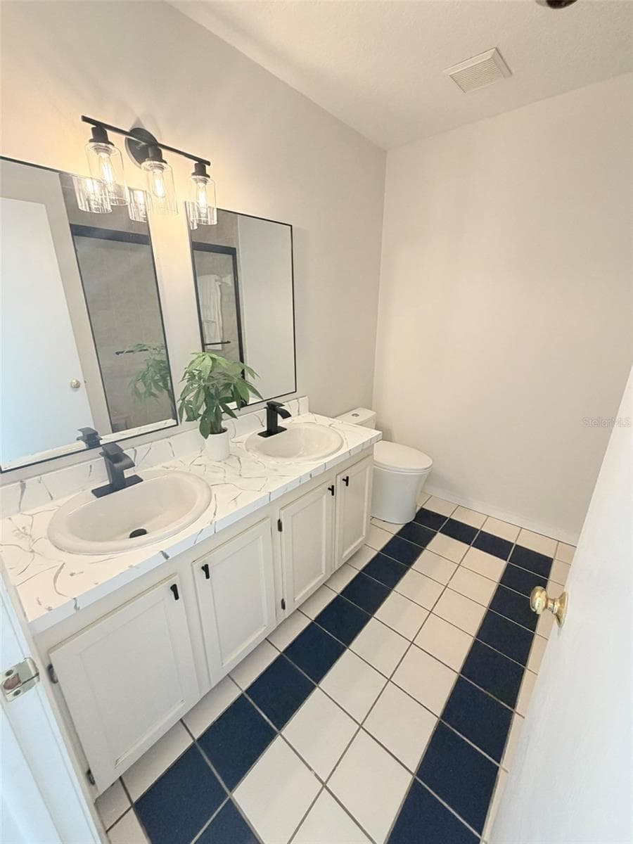 Double Vanity in Primary Bath - 19201 VISTA LN #D2, INDIAN SHORES