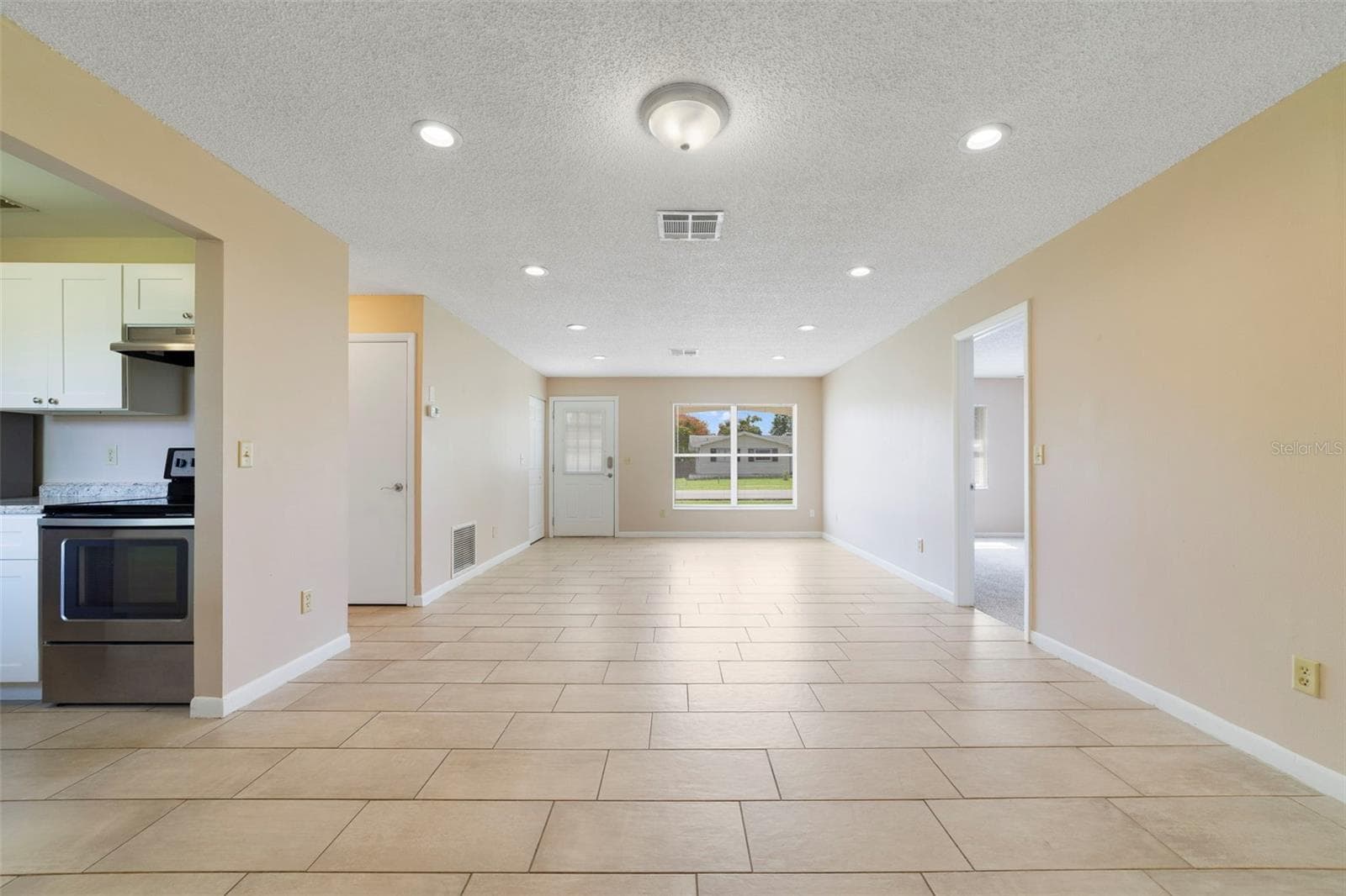 Foyer / Living Room / Dining Room - 2638 BEAL ST, DELTONA