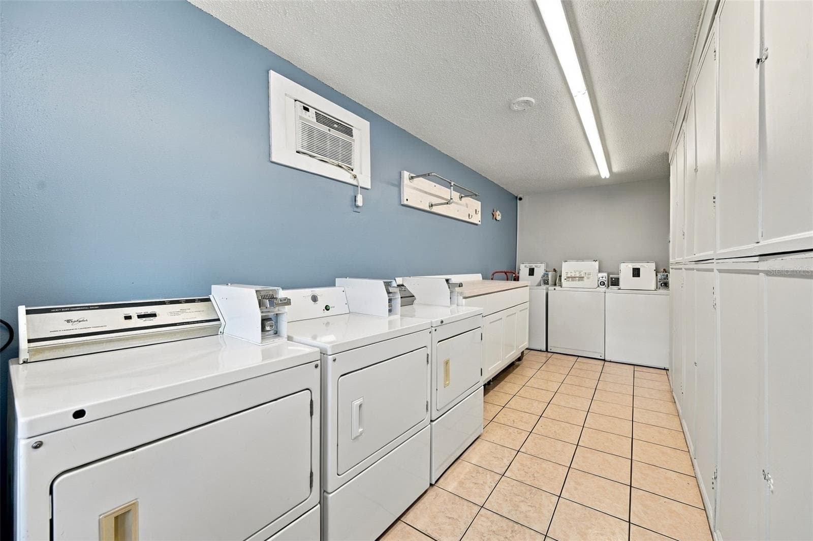 Common area laundry on 3rd and 6th floor - 285 107TH AVE #407, TREASURE ISLAND
