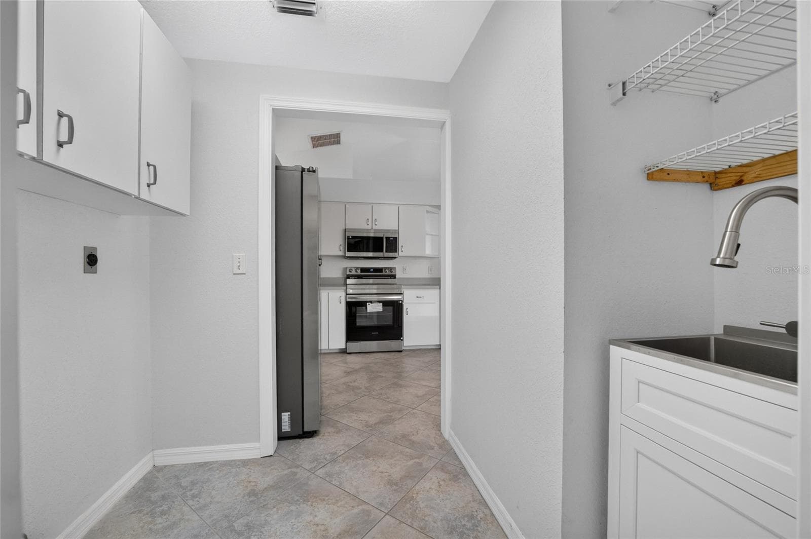 New Stainless Steel Laundry sink - 7558 SW 103RD LOOP, OCALA