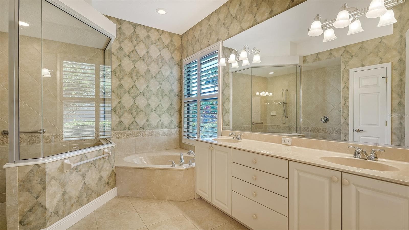 master bathroom with double vanities, soaking tub and walk in shower - 13978 SIENA LOOP, LAKEWOOD RANCH