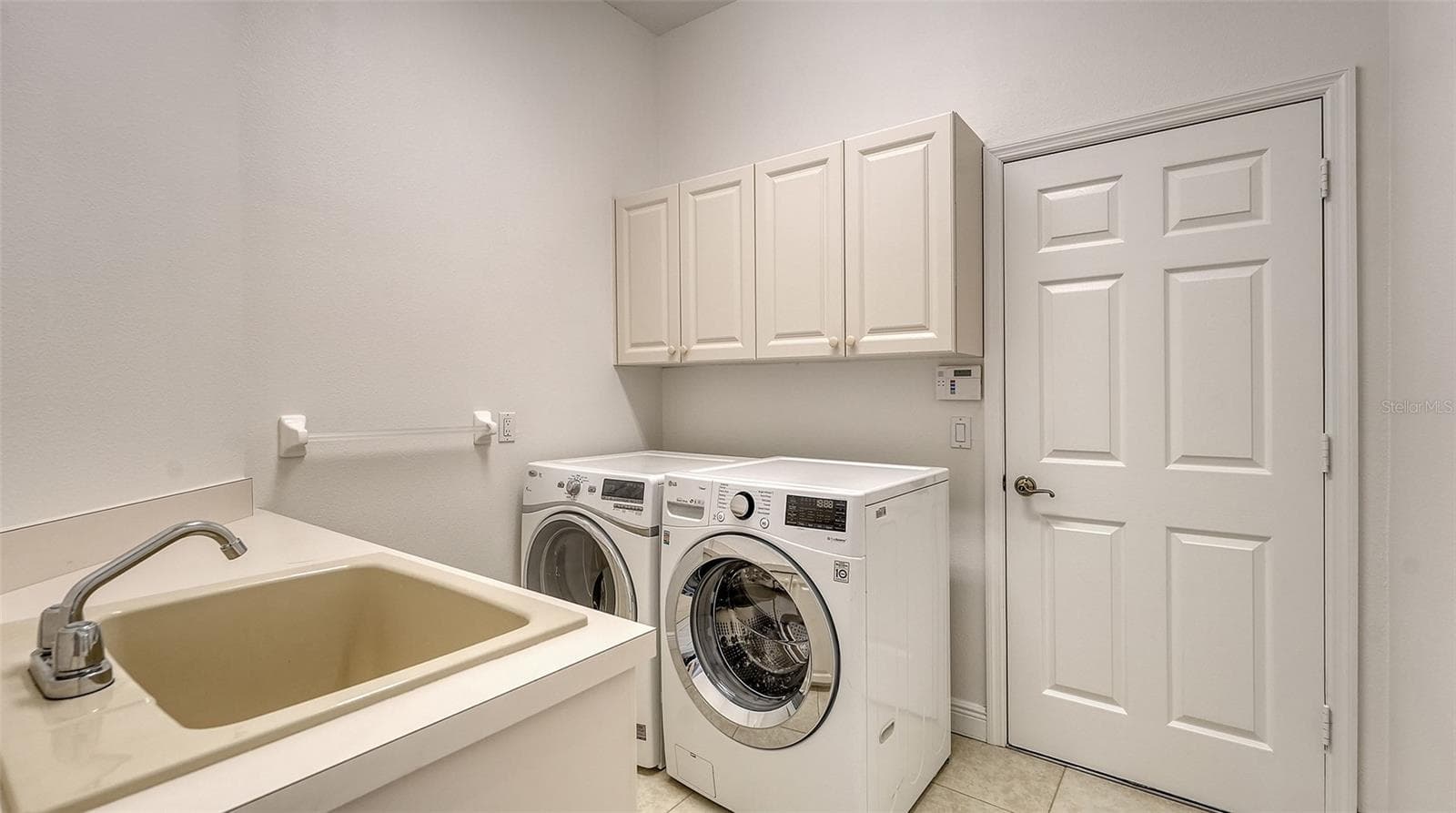 Laundry room with newer washer and dryer - 13978 SIENA LOOP, LAKEWOOD RANCH