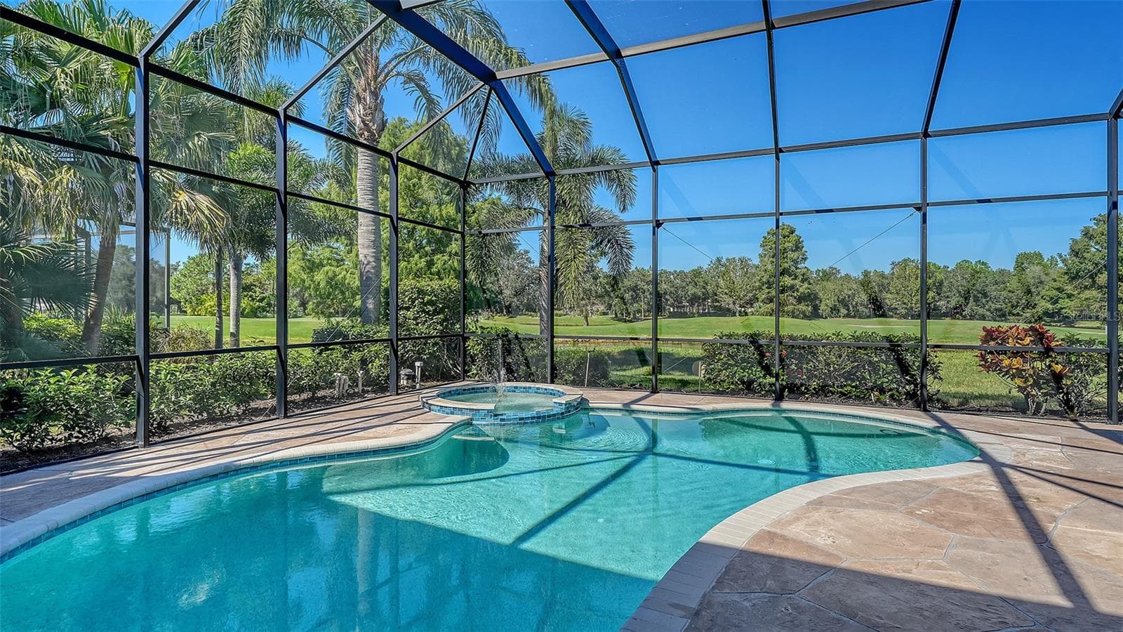 New light and bright pool coping around pool and spa - 13978 SIENA LOOP, LAKEWOOD RANCH
