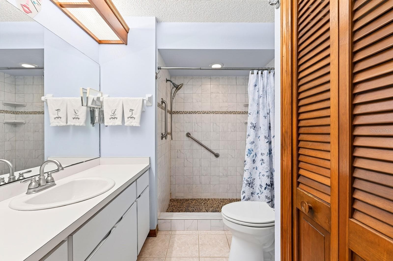 The Primary en suite Bath. - 2163 NEWMARK DR, DELTONA