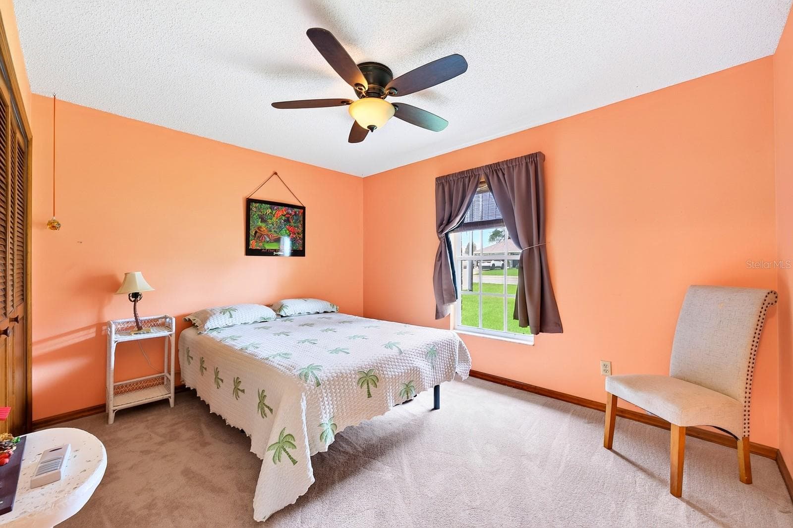 Bedroom 2 is perfectly sized for use as a guest room, hobby space of home office. - 2163 NEWMARK DR, DELTONA