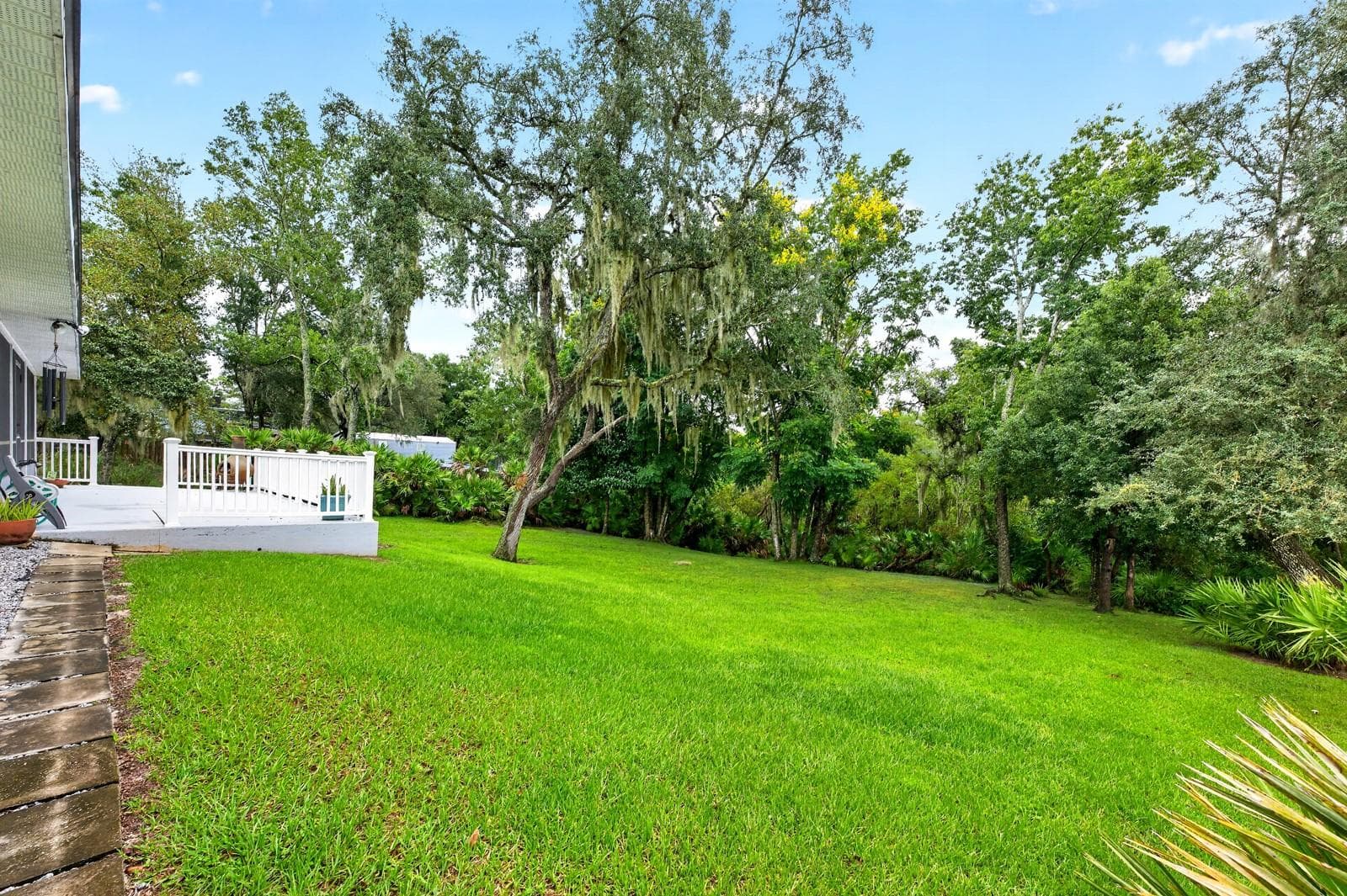 A beautiful backyard and NO HOA gives you the freedom and flexibility to make the property your own. - 2163 NEWMARK DR, DELTONA