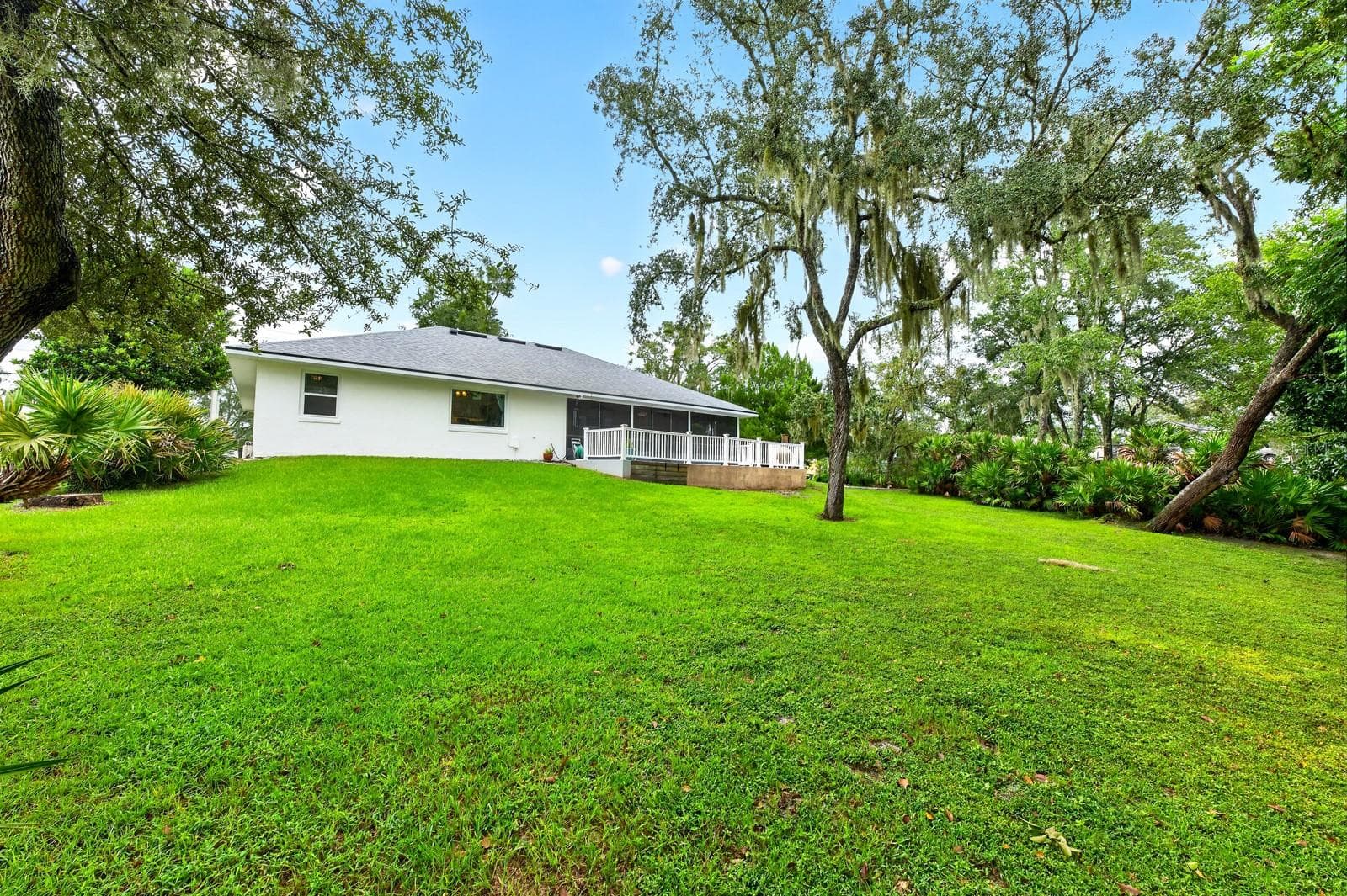 The back of the home. - 2163 NEWMARK DR, DELTONA