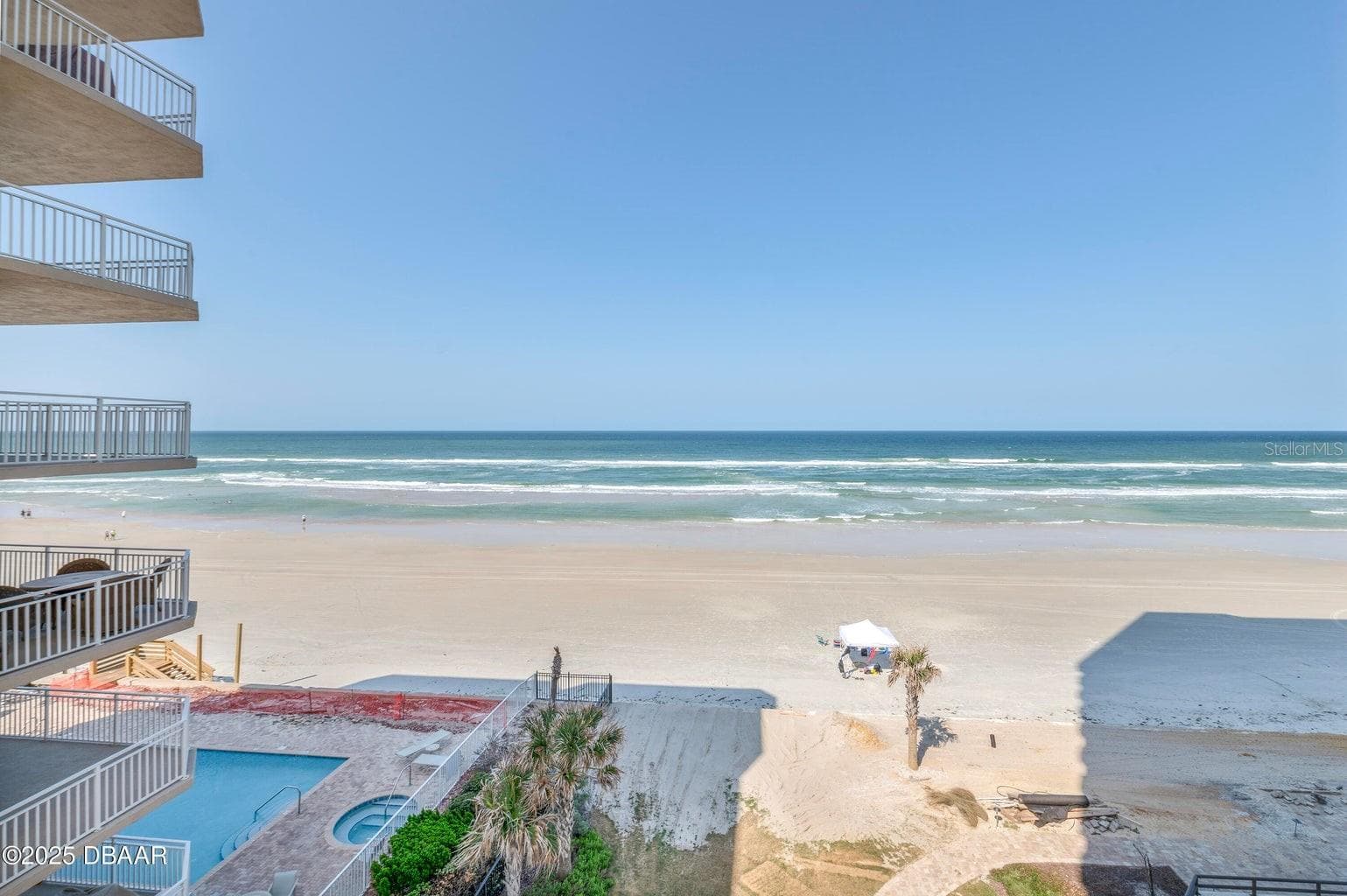 Take in spectacular views of the Atlantic Ocean, sandy shoreline, and rolling waves. The beachfront setting also offers views of the pool area below. - 3855 S ATLANTIC AVE #401, DAYTONA BEACH